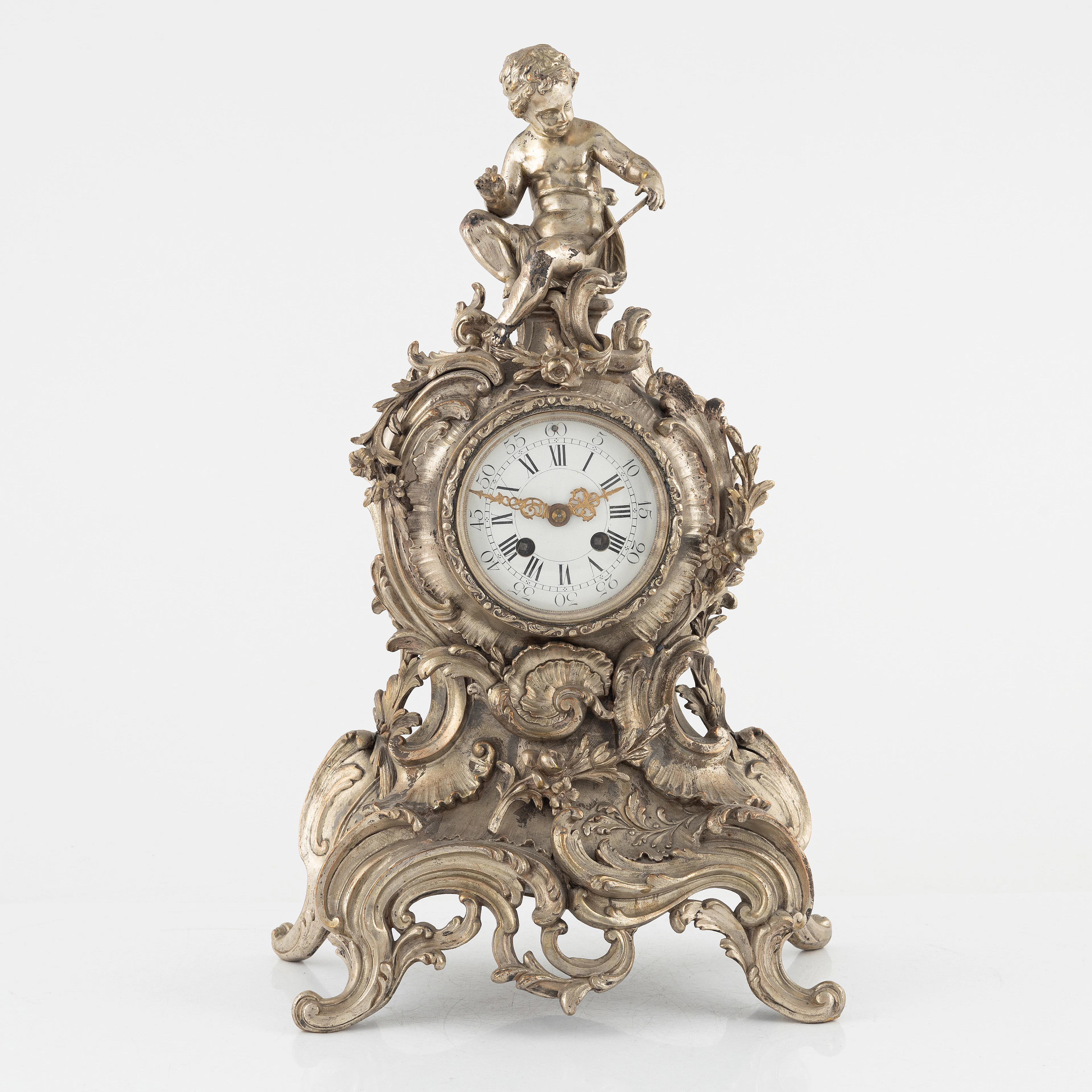 A Rococo style mantle clock, France, late 19th Century.