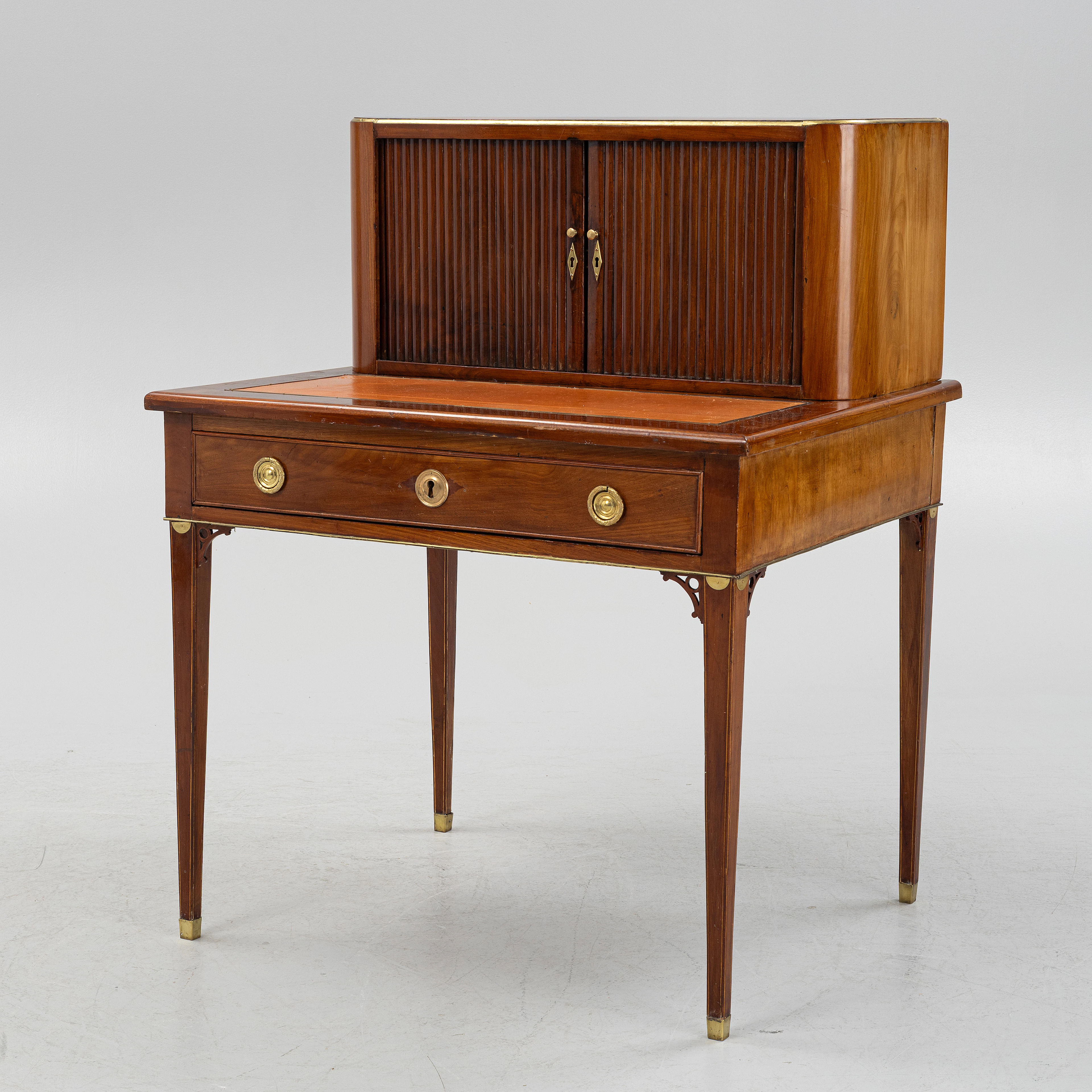 A late Gustavian mahogany 'Bonheur de jour' desk in the manner of C
