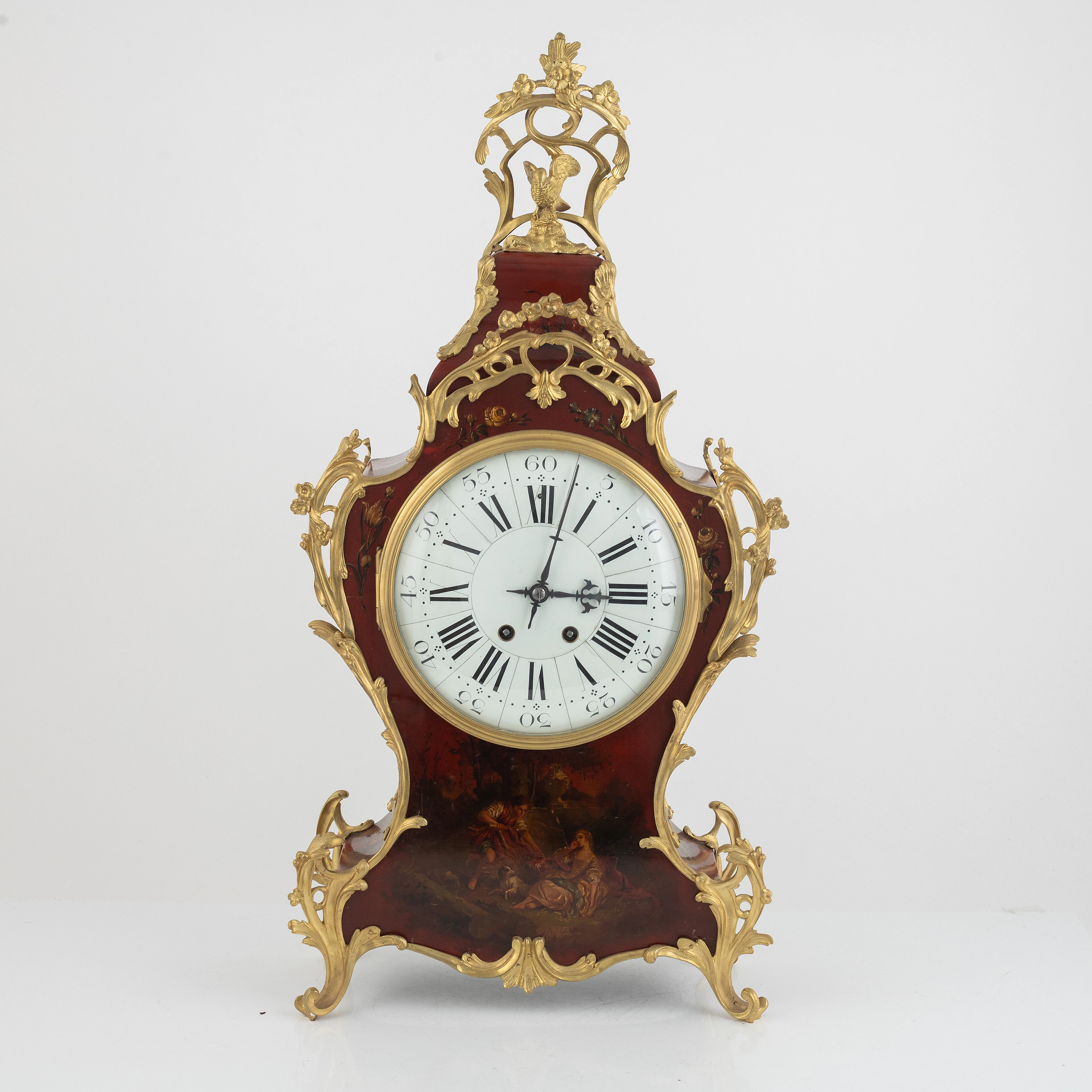 A rococo-style clock with bracket