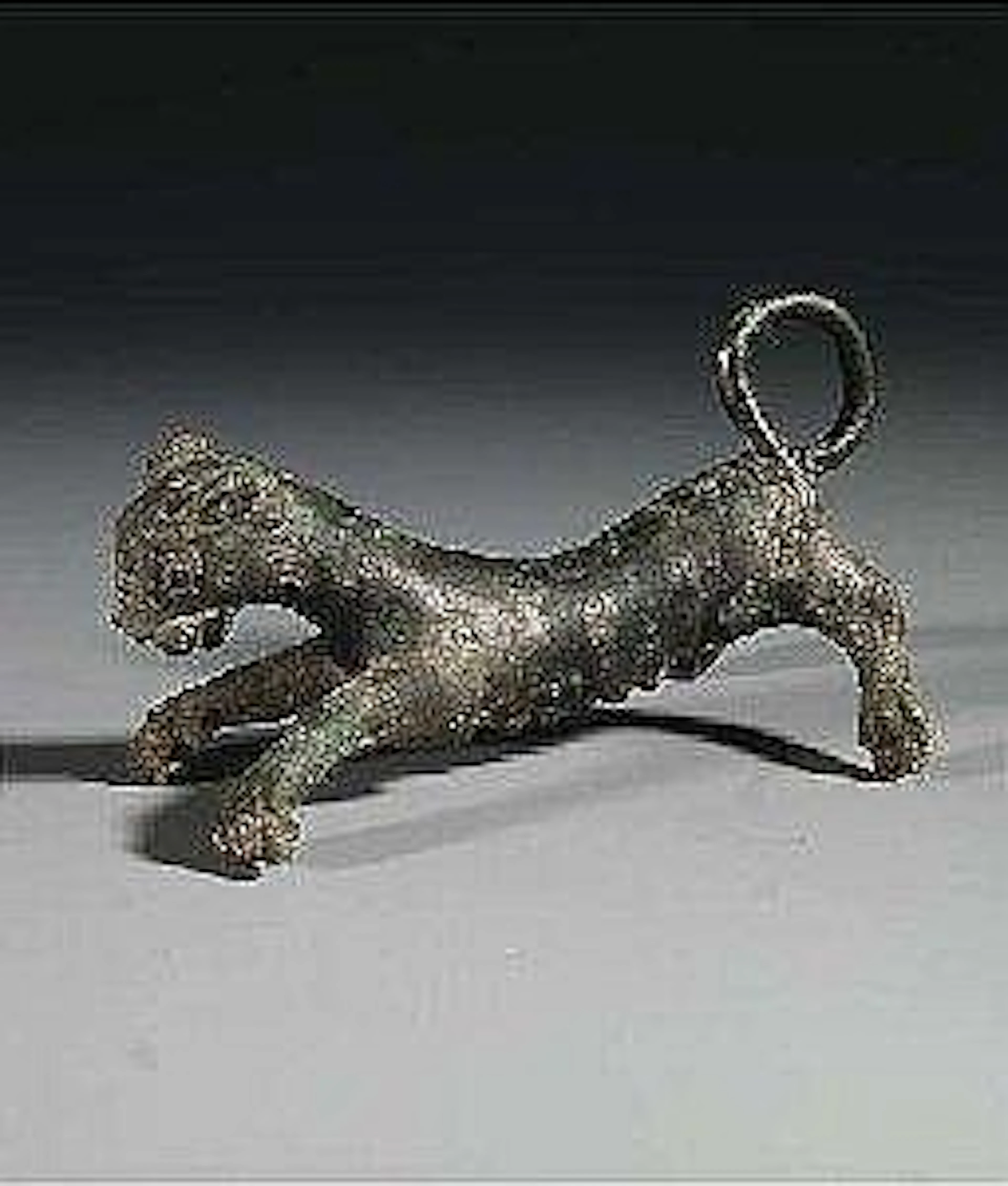 A BRONZE SKULPTURE OF A FEMALE PANTHER