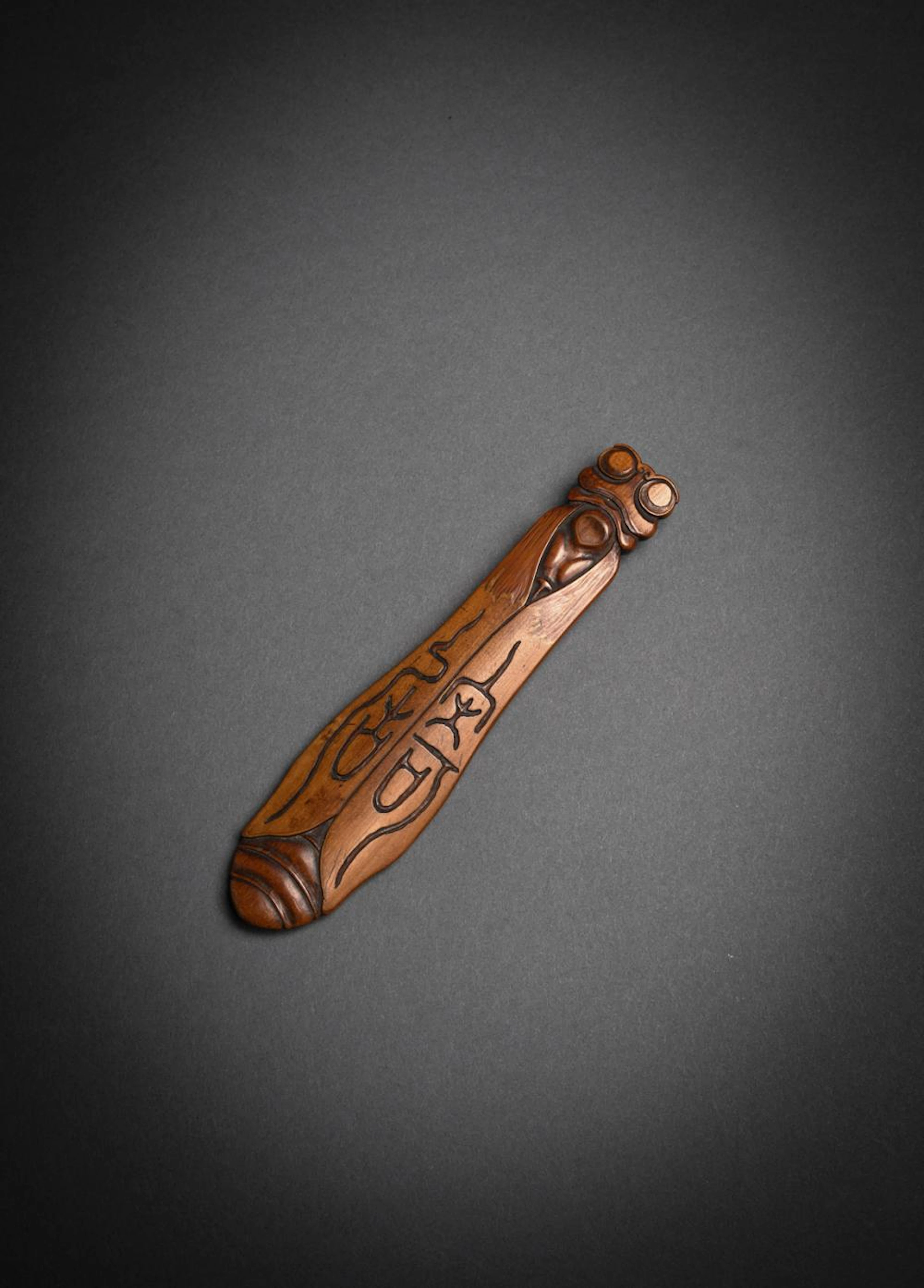 AN INSCRIBED SASHI BAMBOO NETSUKE IN SHAPE OF A CICADA