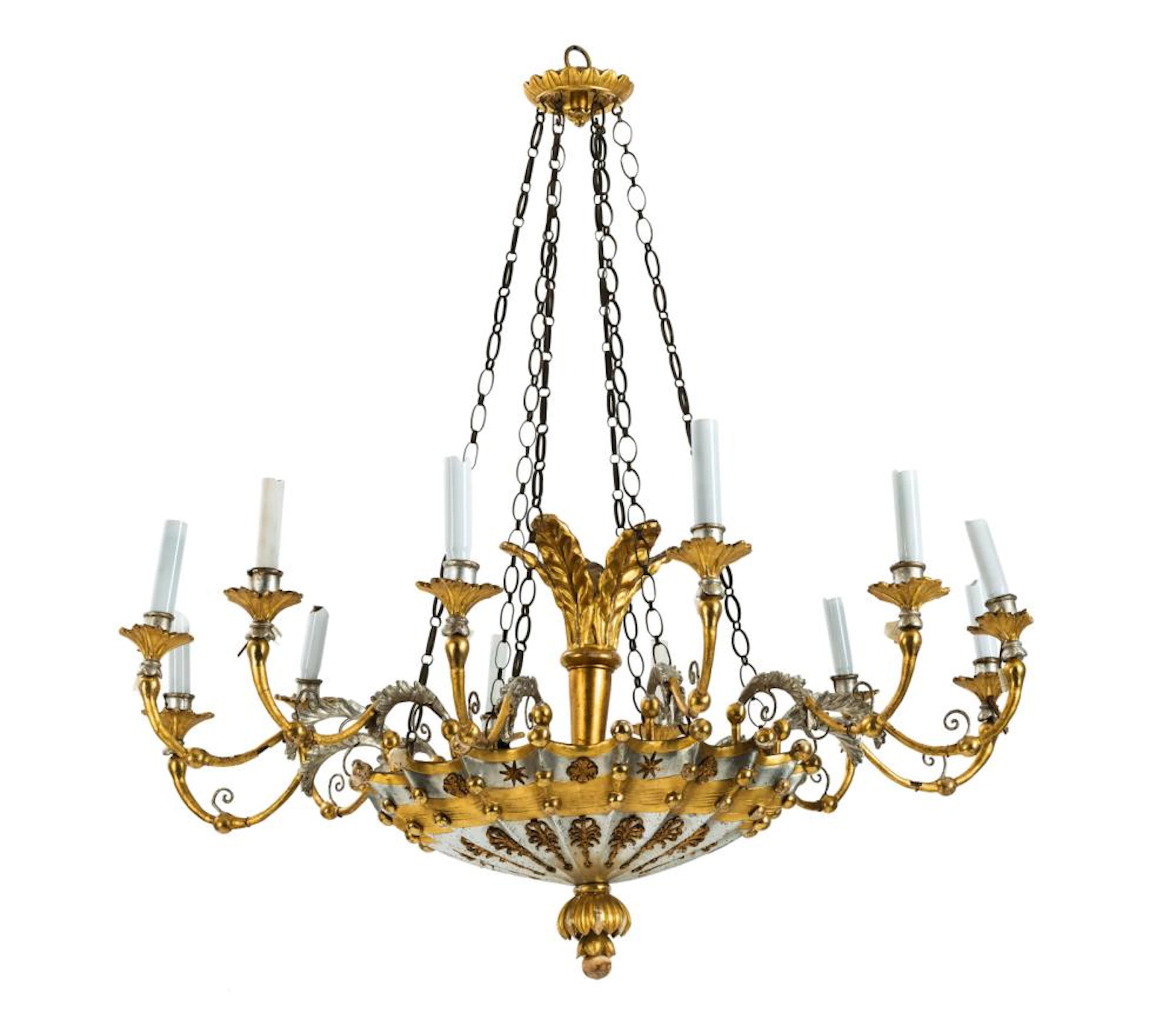 AN ELABORATE CARVED, SILVERED AND GILT BIEDERMEIER CHANDELIER