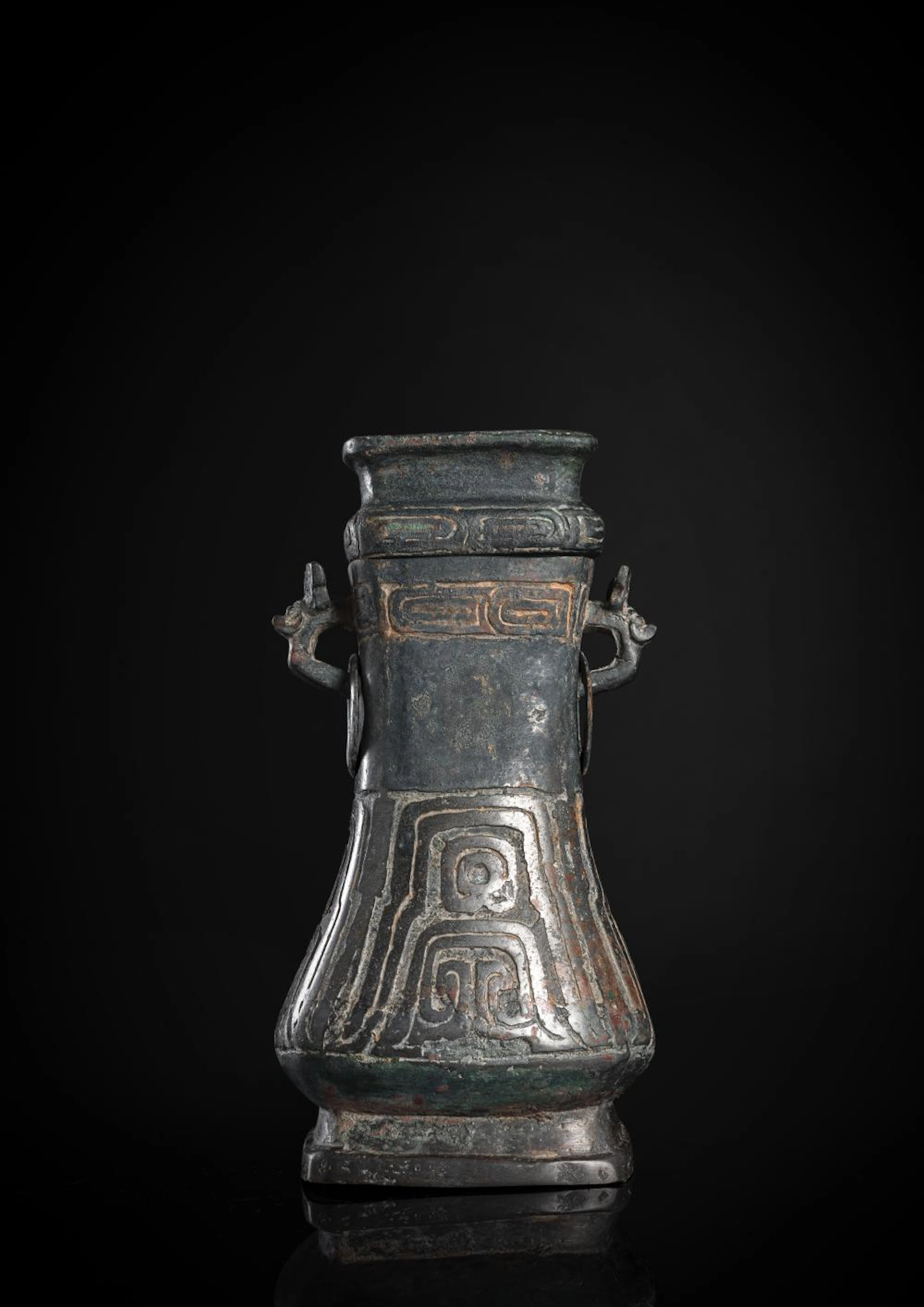 AN ARCHAIC RITUAL BRONZE VESSEL WITH COVER 'FANG HU'