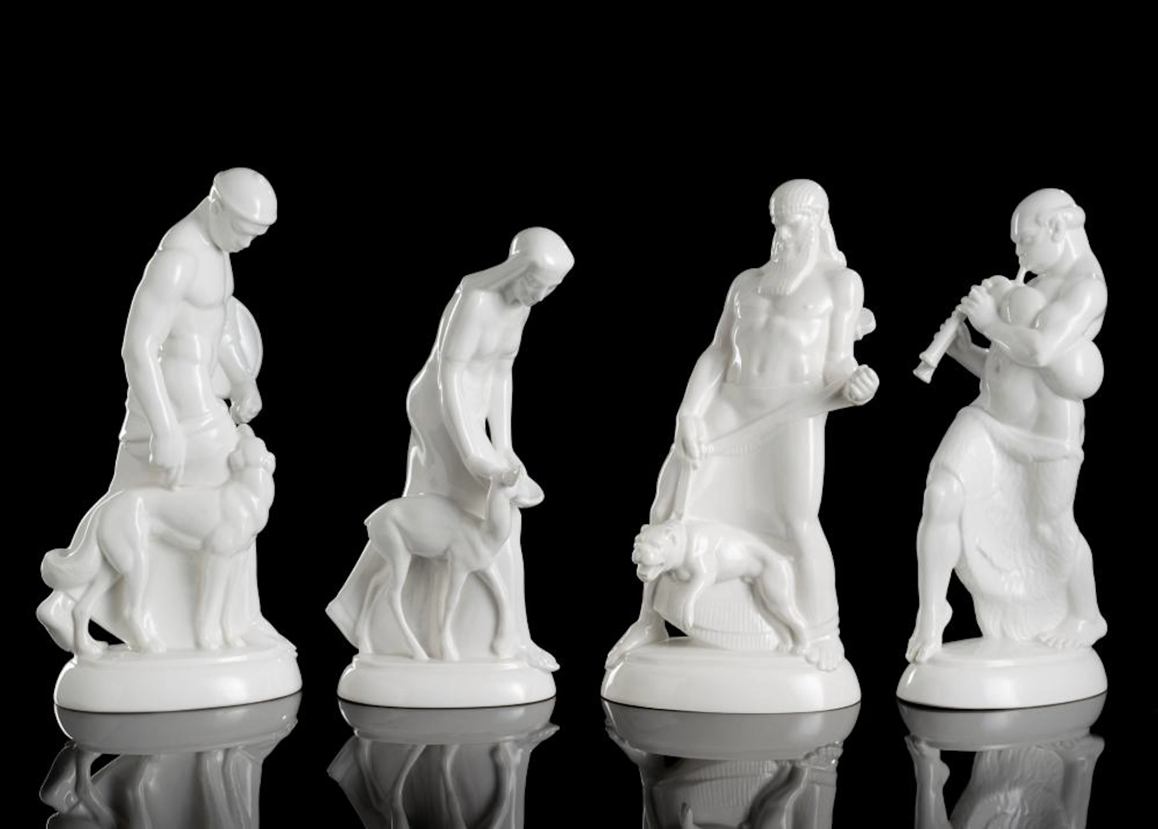 FOUR FIGURINES FROM THE "HOCHZEITSZUG" CENTREPIECE