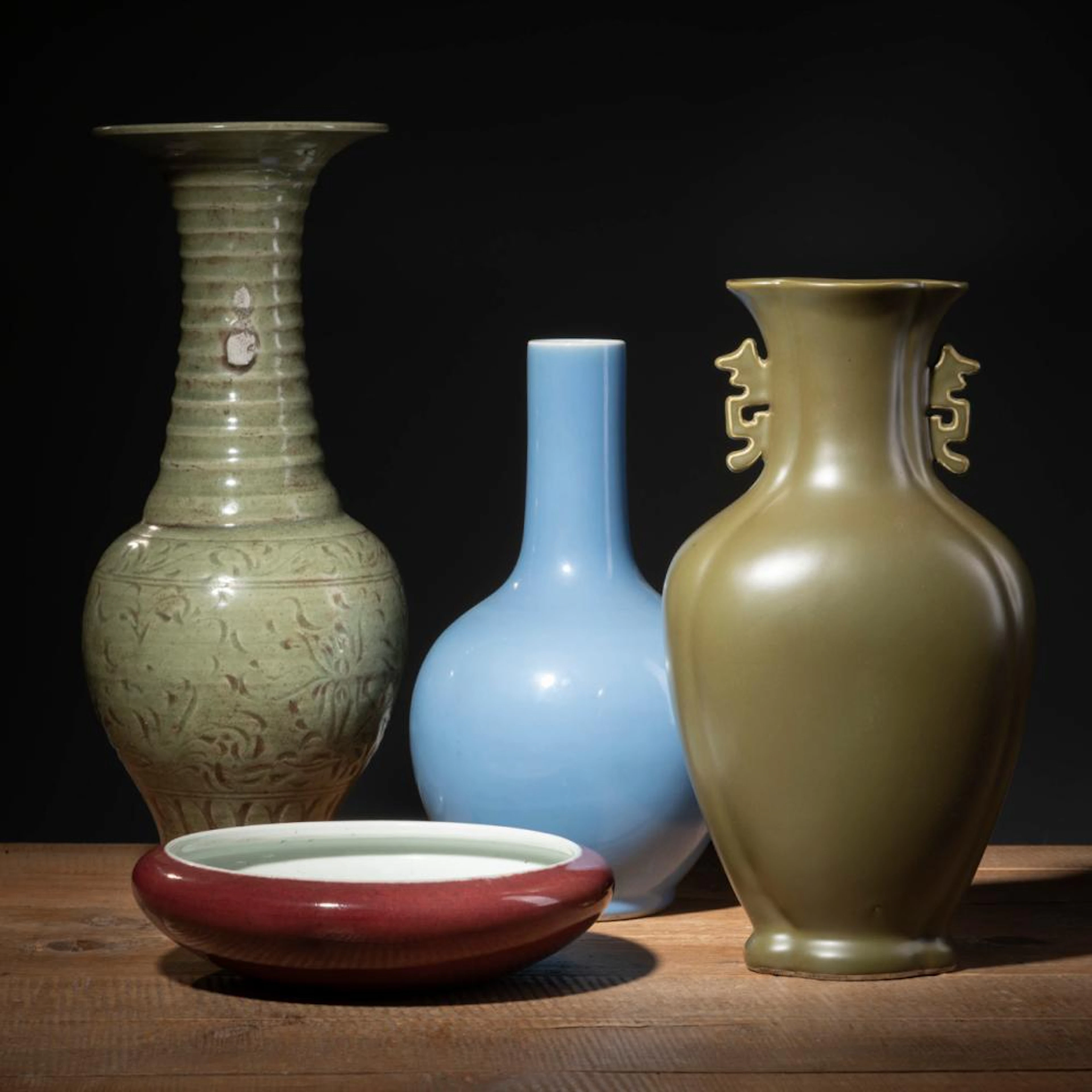 THREE MONOCHROME GLAZED VASES AND A RED GLAZED BRUSH WASHER