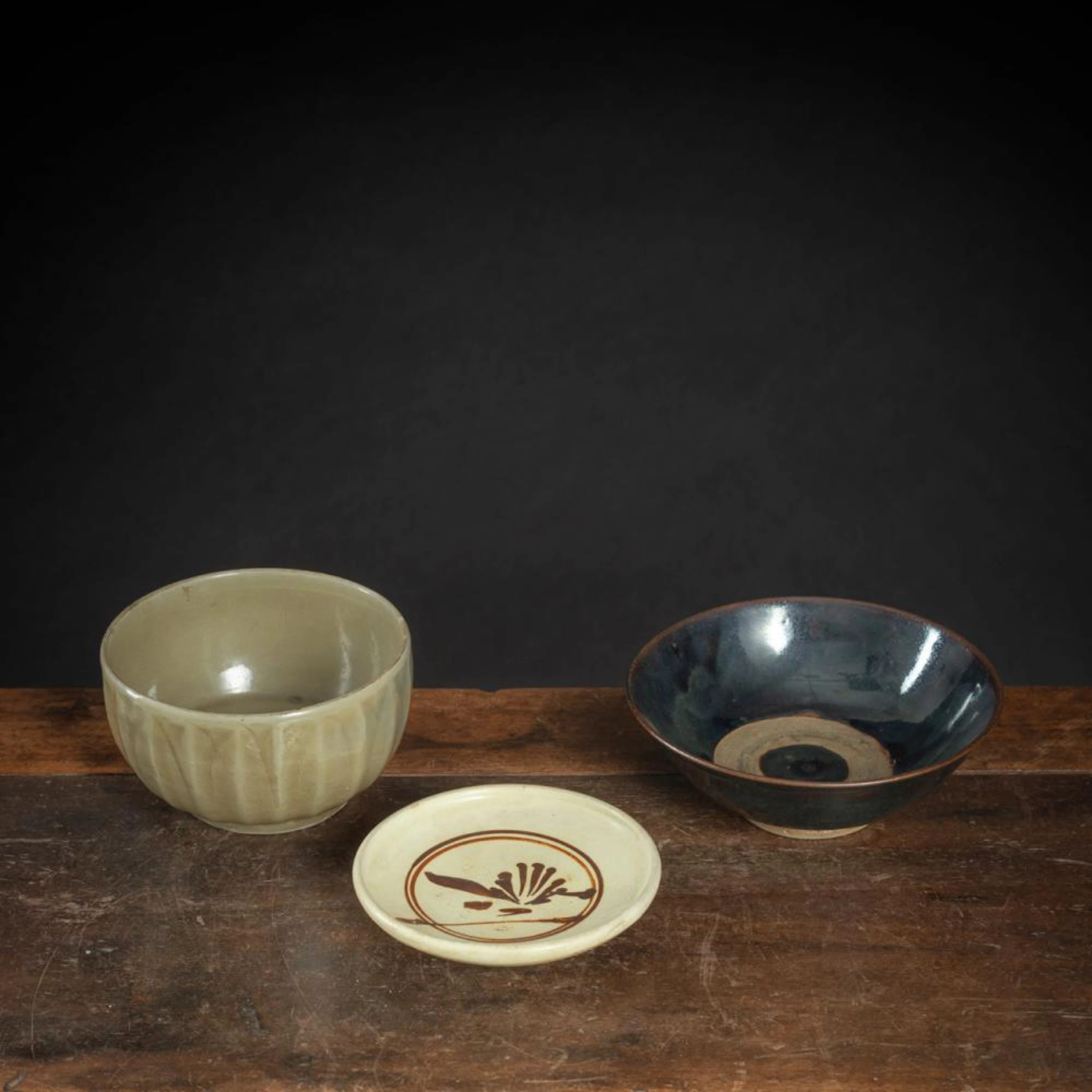 A LONGQUAN DEEP BOWL, A HENAN BOWL AND A CIZHOU DISH WITH FLOWER DECORATIO