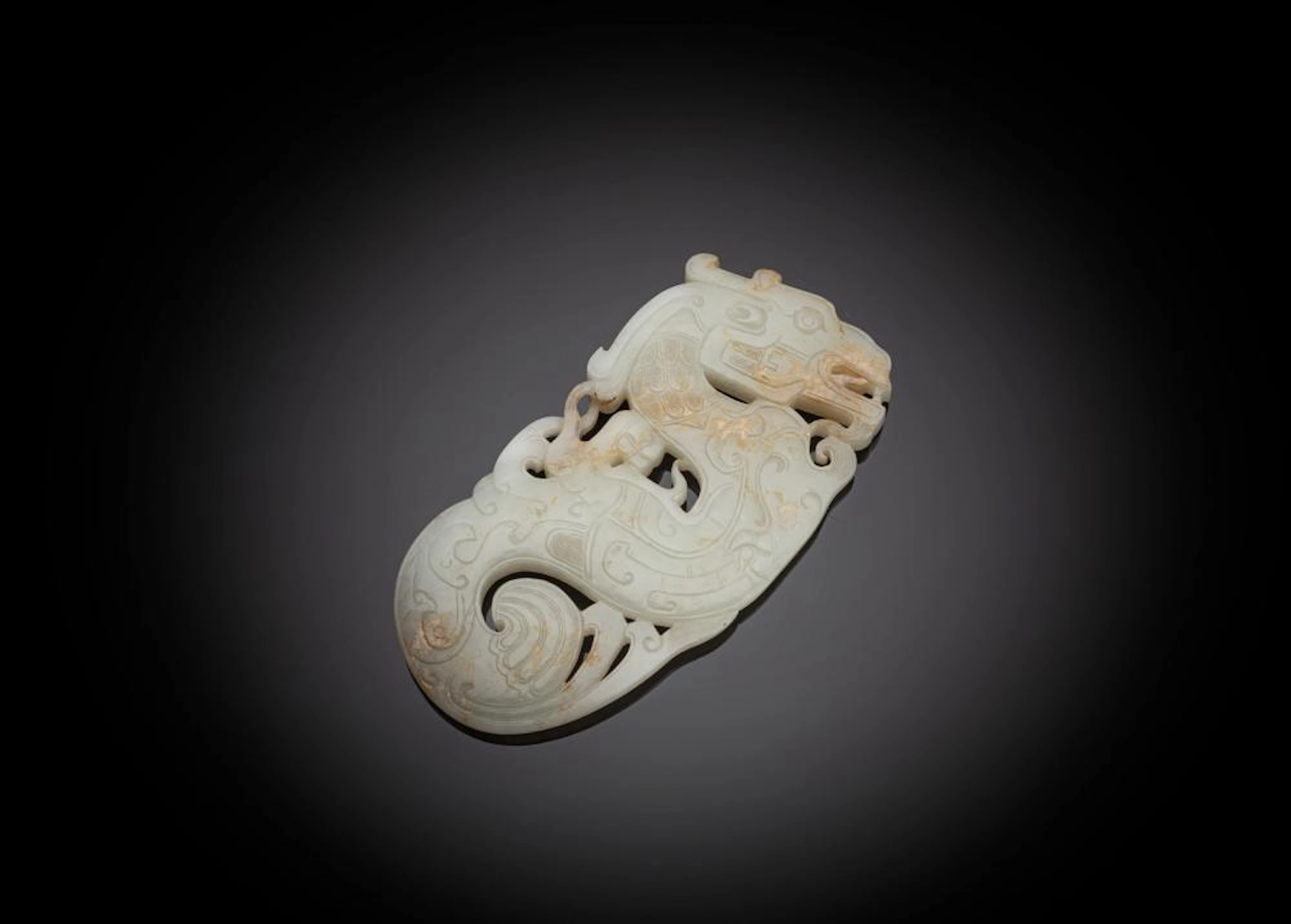 A JADE CARVING OF A DRAGO