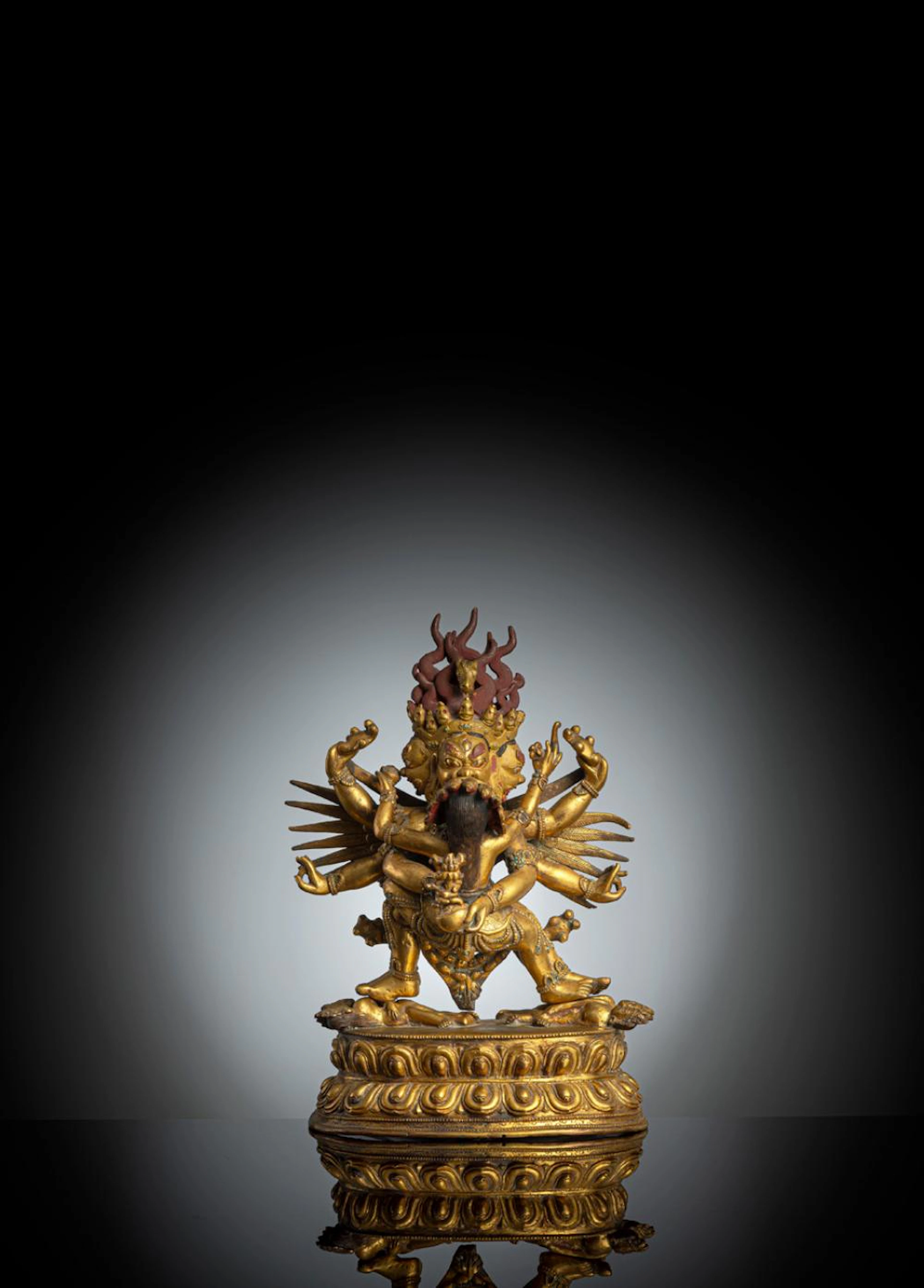 A GILT-BRONZE FIGURE OF HAYAGRIVA IN YAB-YUM