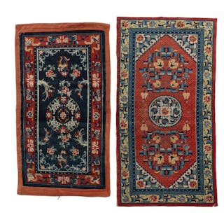 TWO WOOL (SADDLE) RUGS WITH FLORAL MEDALLION AND ORNAMENTAL BORDER DESIGN