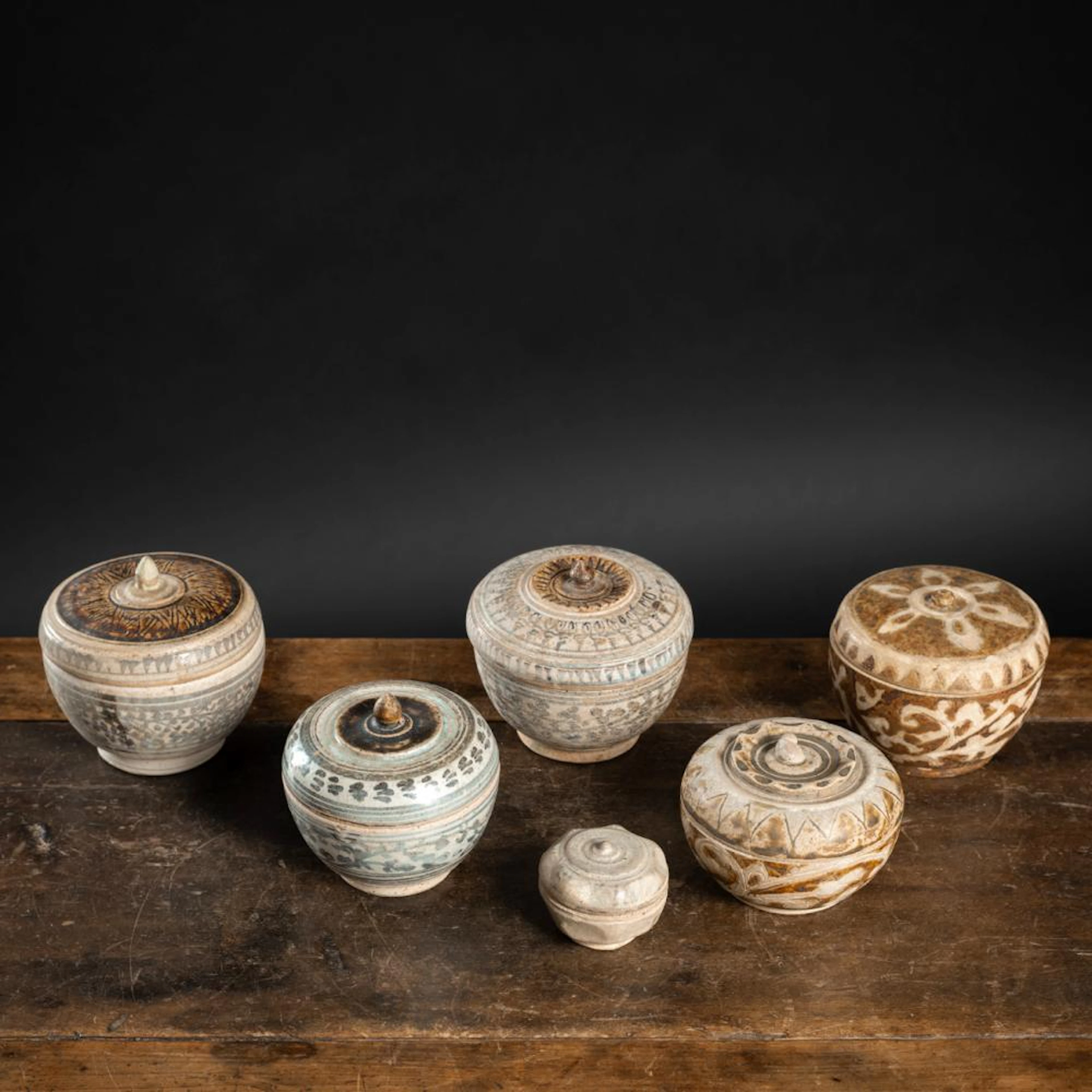 SIX CERAMIC BOXES AND COVERS