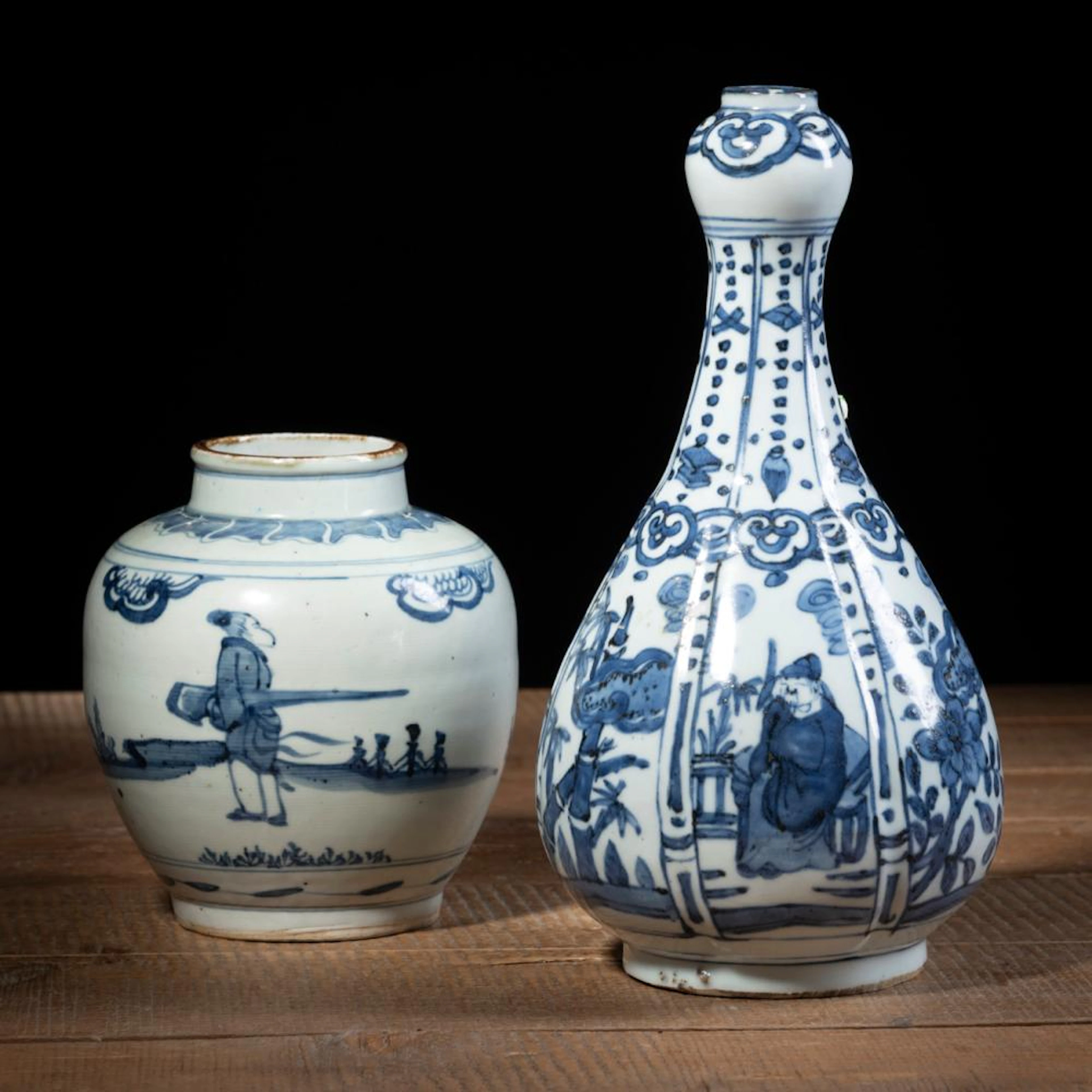 A BLUE AND WHITE PORCELAIN FIGURAL BOTTLE VASE AND A JARLET