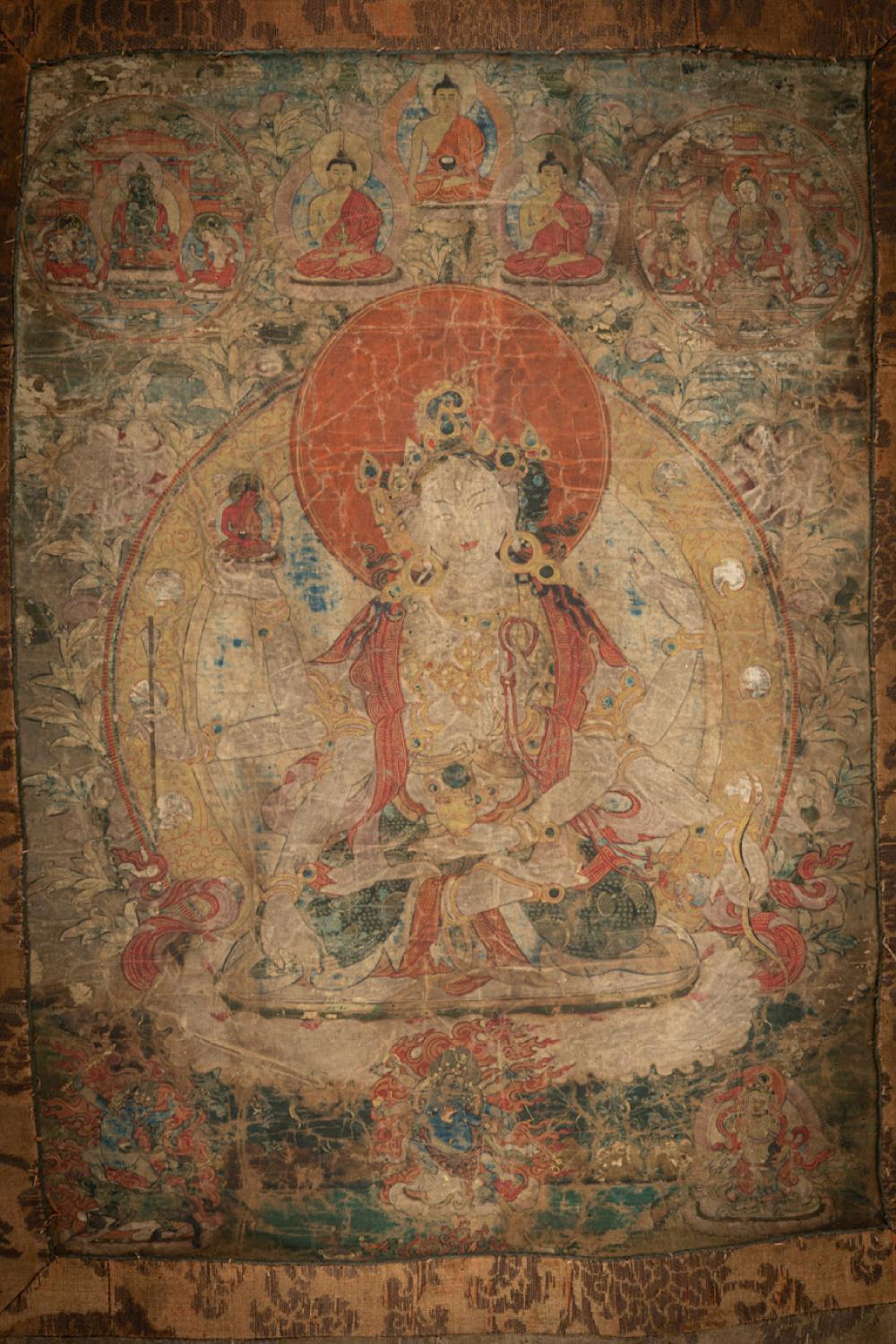 A THANGKA WITH CENTRAL DEPICTION OF USHNISHAVIJAYA