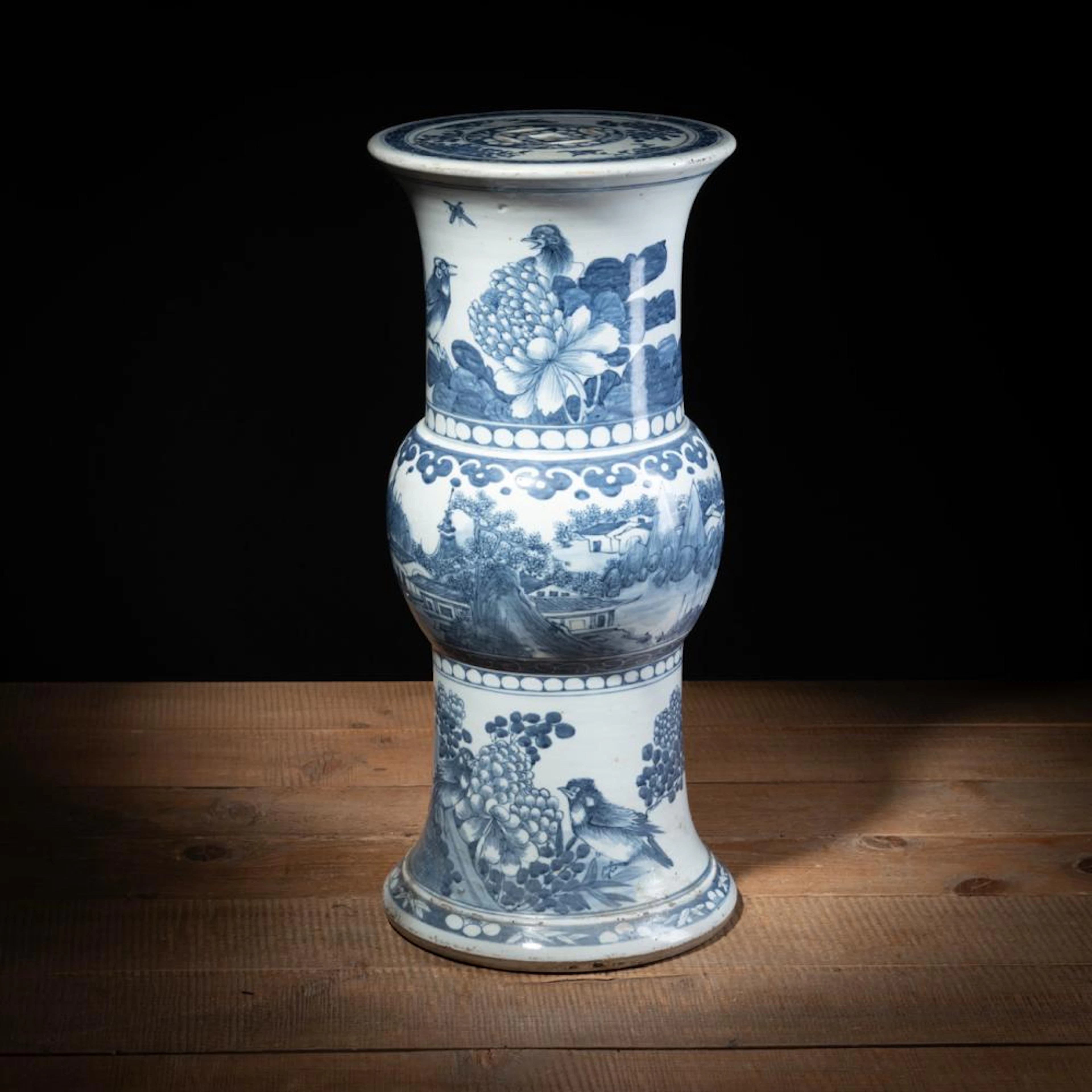 A 'GU'-SHAPED BLUE AND WHITE LANDSCAPE PORCELAIN STOOL