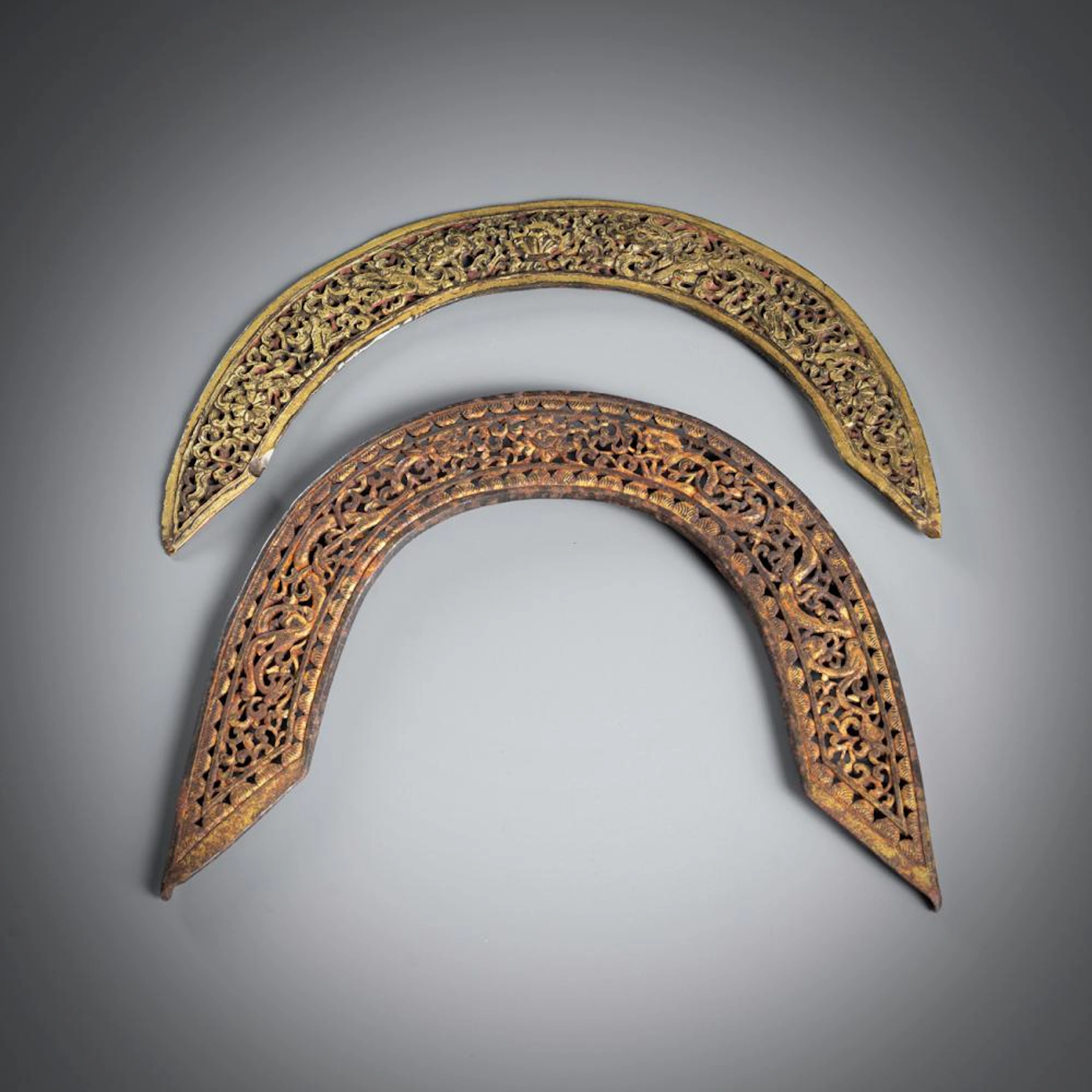 TWO GILT-IRON SADDLE FITTINGS
