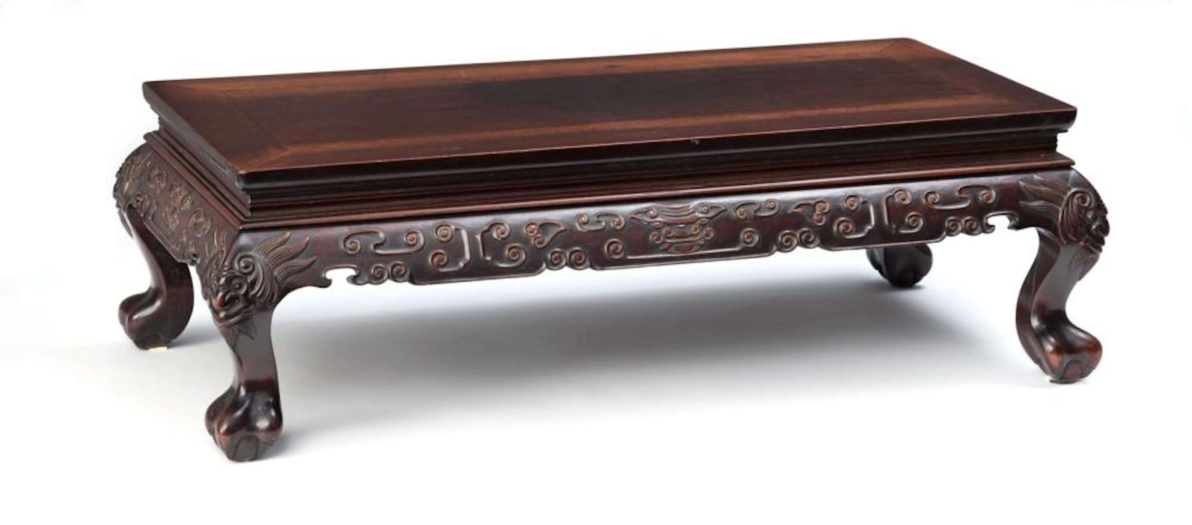 A CARVED APRON LION-FEET 'HONGMU' LOW TABLE