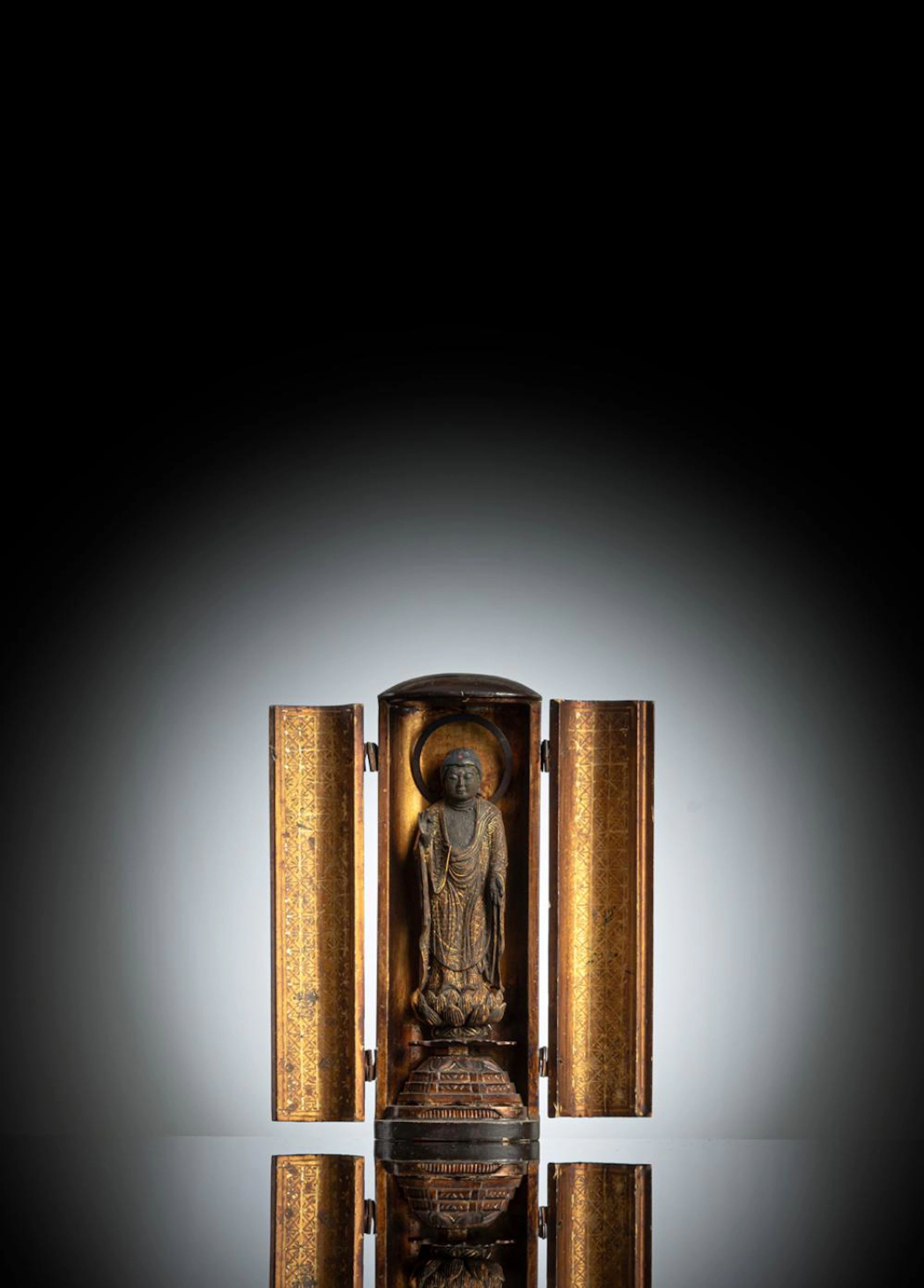 A MINIATURE GILT- AND BLACK-LACQUERED WOOD SHRINE (ZUSHI)