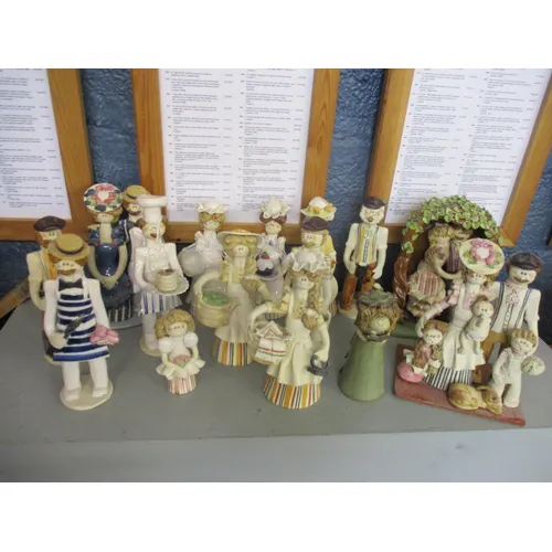 A collection of Laura Dunn pottery figures A/F. Location:LWB | Barnebys