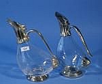 2 glass and silver-plated decanters, h. 25 cm.