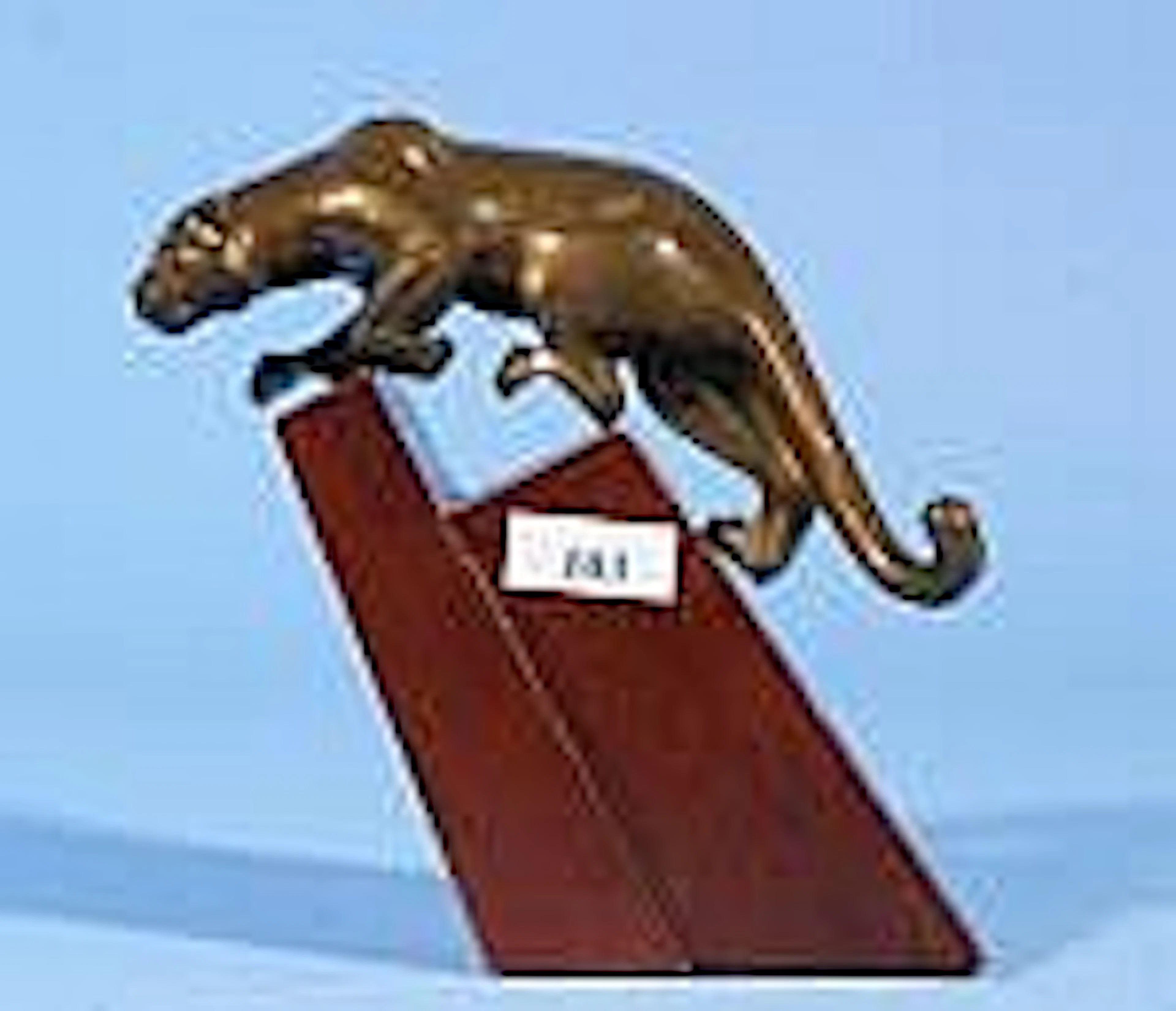 Bronze panther on wooden base, h. 12 cm.
