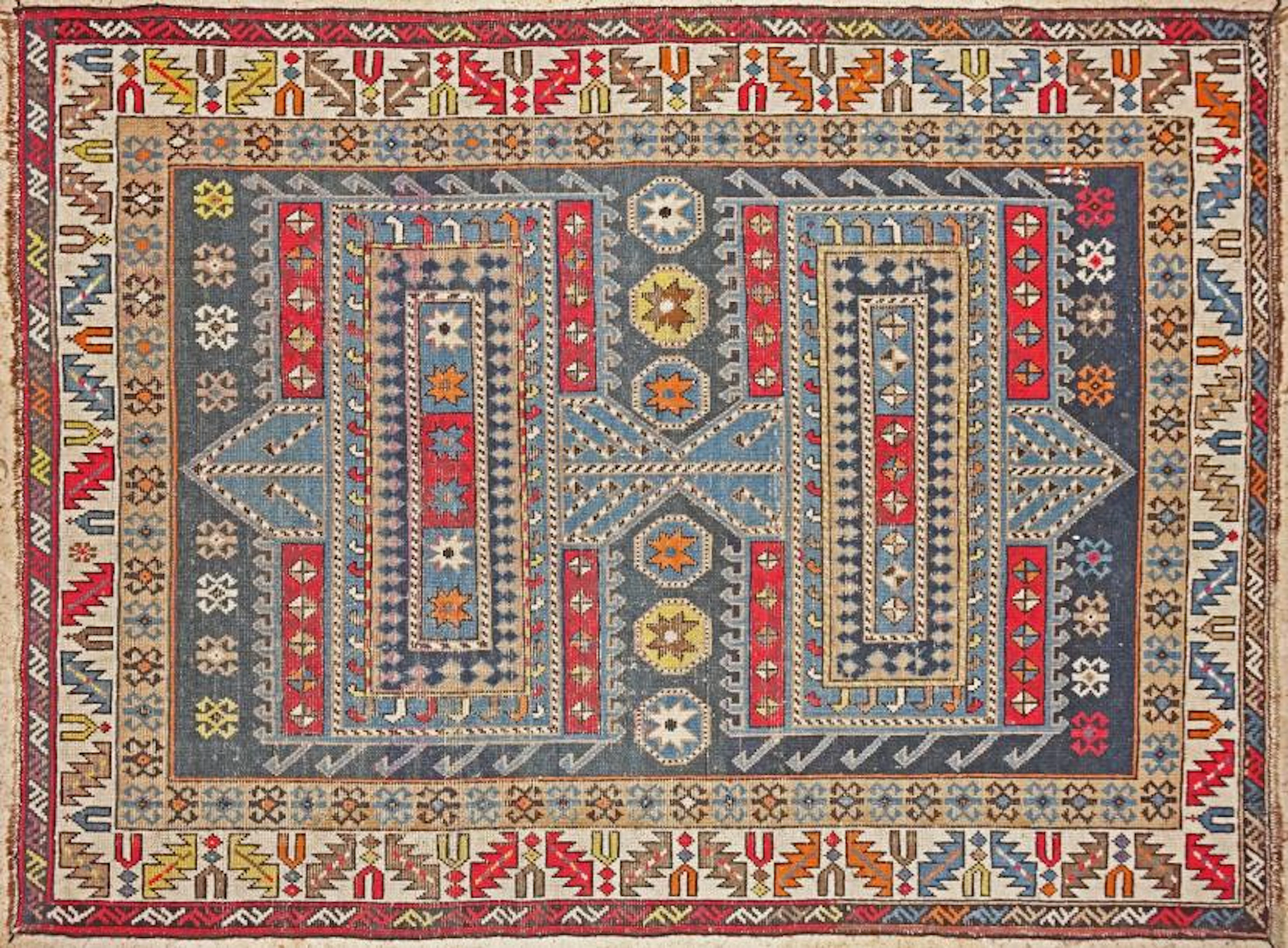 Tapis Kazak à décor géométrique polychrome…