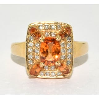 A 14ct Y/G diamond and citrine cluster ring. Size O