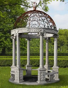 Ω A CARVED LIMESTONE AND WROUGHT IRON MOUNTED ROTUNDA | Barnebys