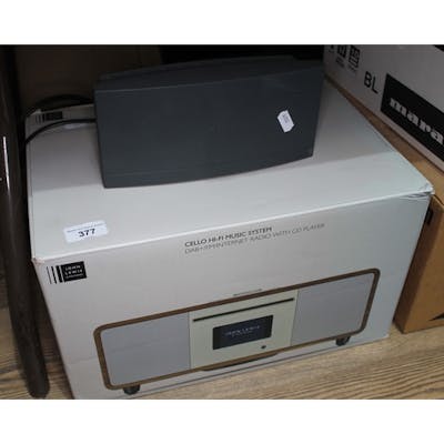 A Bose Wave CD music player and a Bose Wave Dab module. | Barnebys
