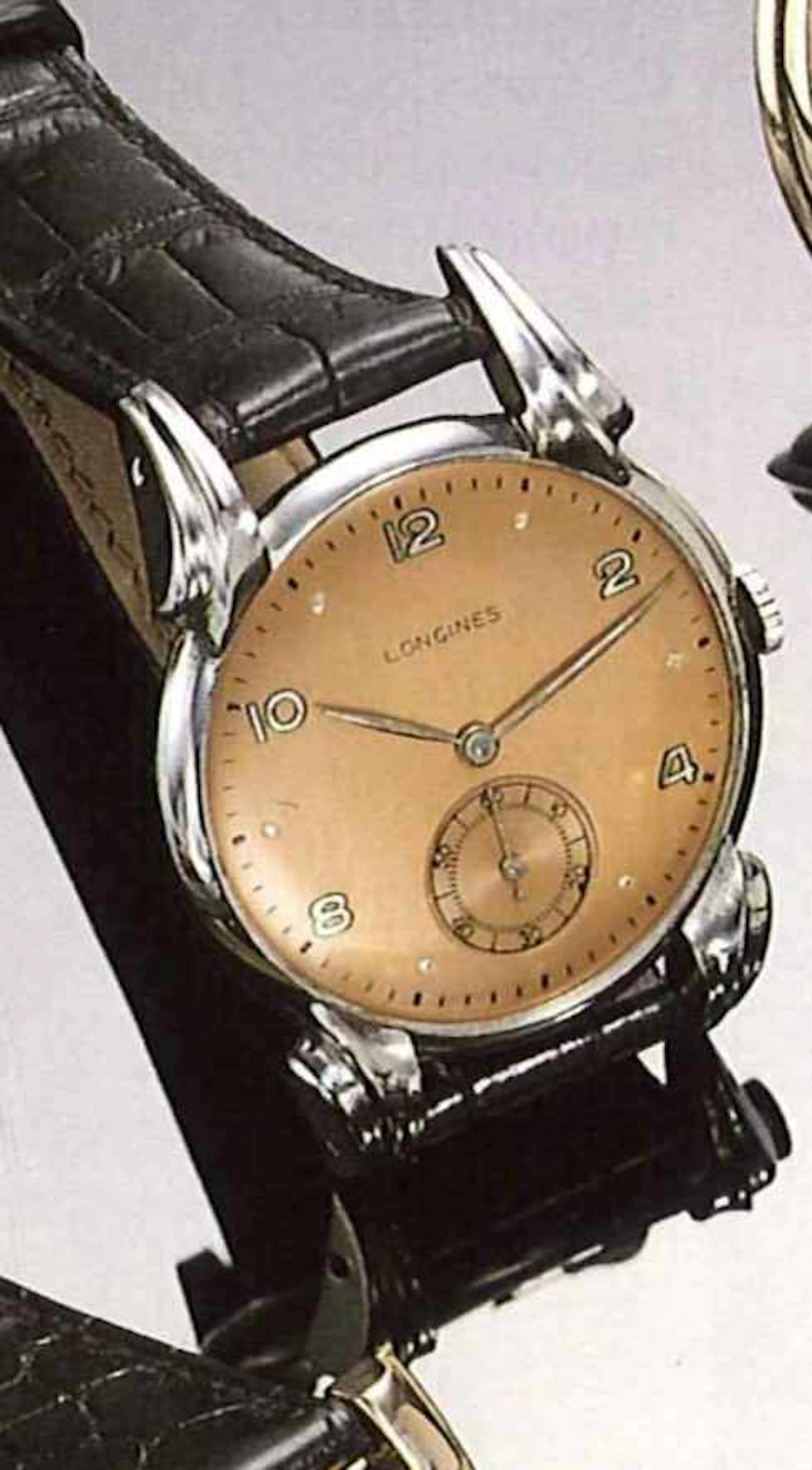 Longines, anni '40. Elegante orologio da polso, per uomo, in acciaio.