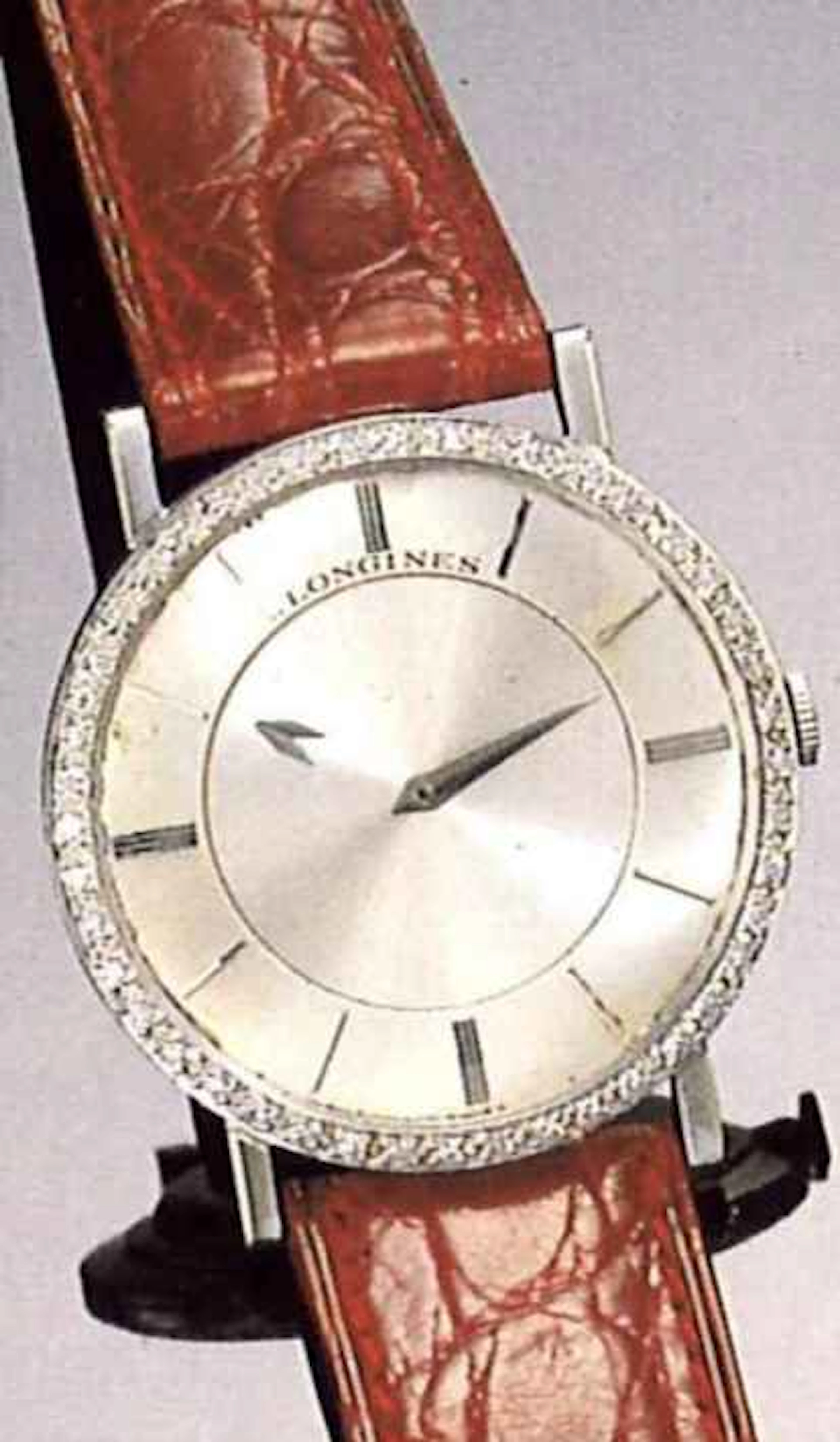 Longines, per il mercato Nord Americano, anni ' 50. Interessante orologio da polso "misterioso" per uomo, in oro bianco 14 ct. e diamanti.