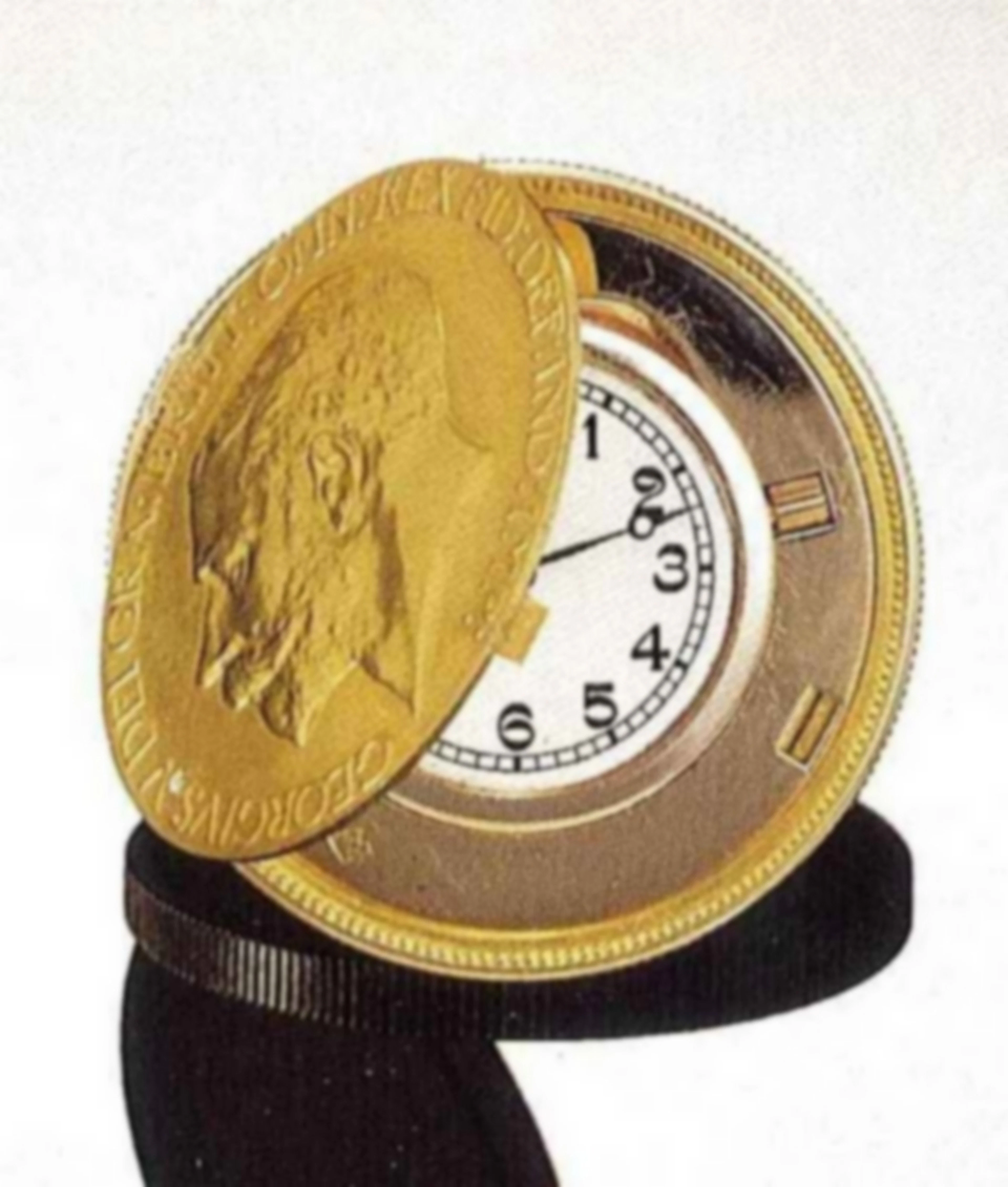 Verger Frères, Paris, anni '20. Interessante orologio inserito in una moneta in oro 18 ct., datata 1911, recante l'effige di Giorgio V.