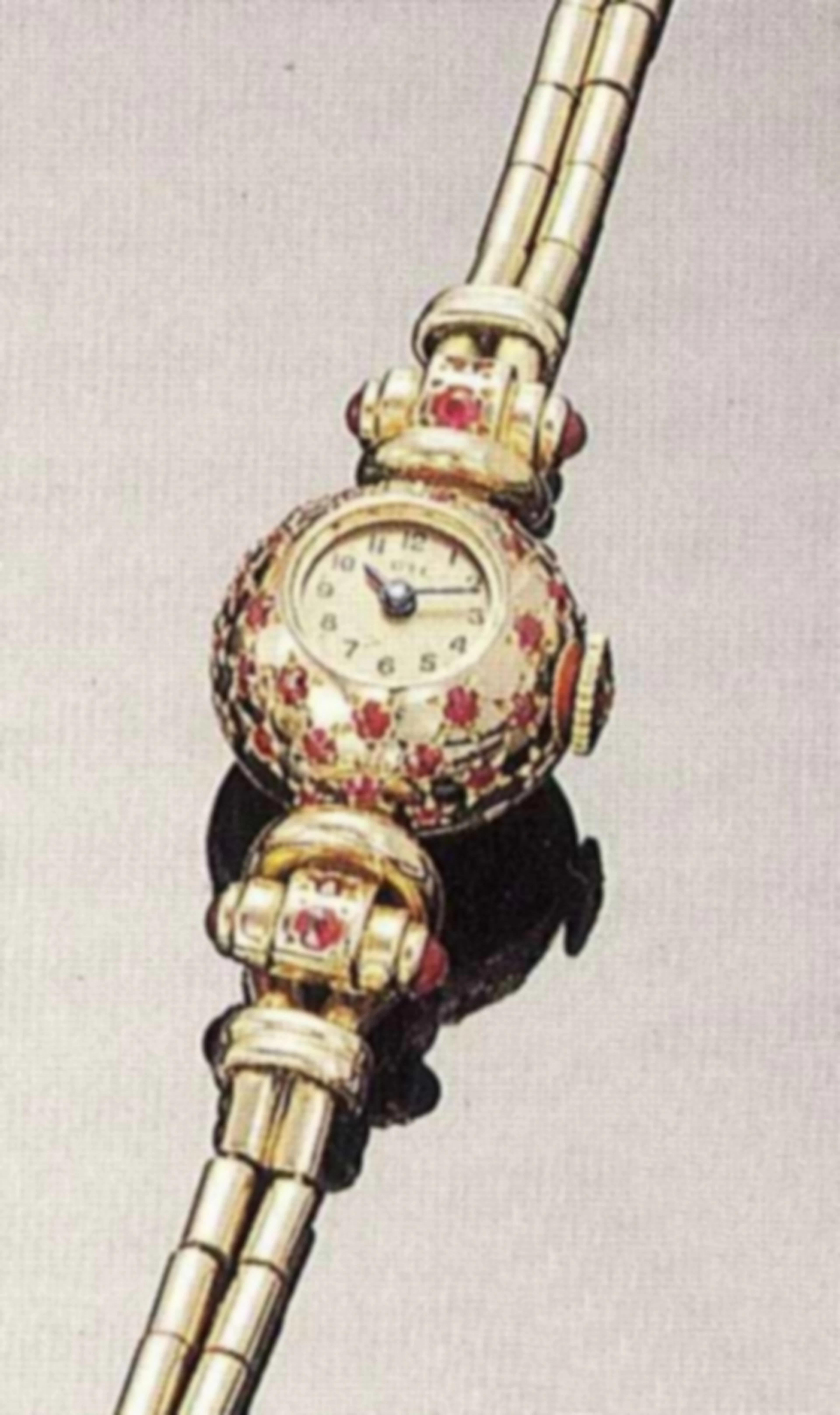 UTI, anni '40. Elegante orologio da polso, per donna, in oro rosa 18 ct. e rubini, con bracciale in oro 18 ct.