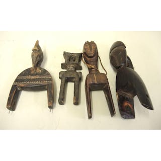 Group of four African tribal Heddle Pulleys (Senufo Guro Dji...
