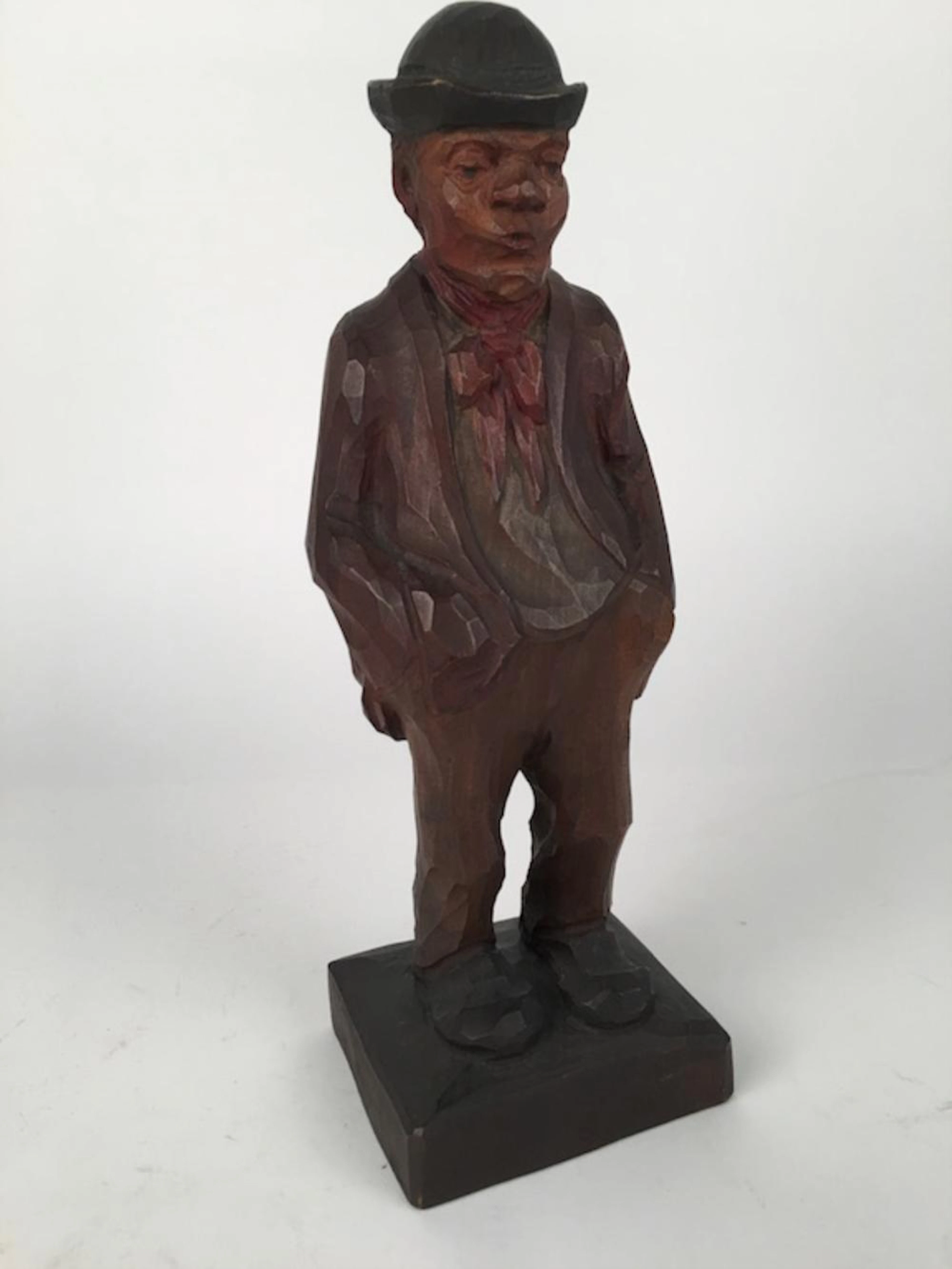 ANTIQUE HAND CARVED GERMAN WHISTLER HIS HANDS IN HIS POCKETS. HEIGHT 13".