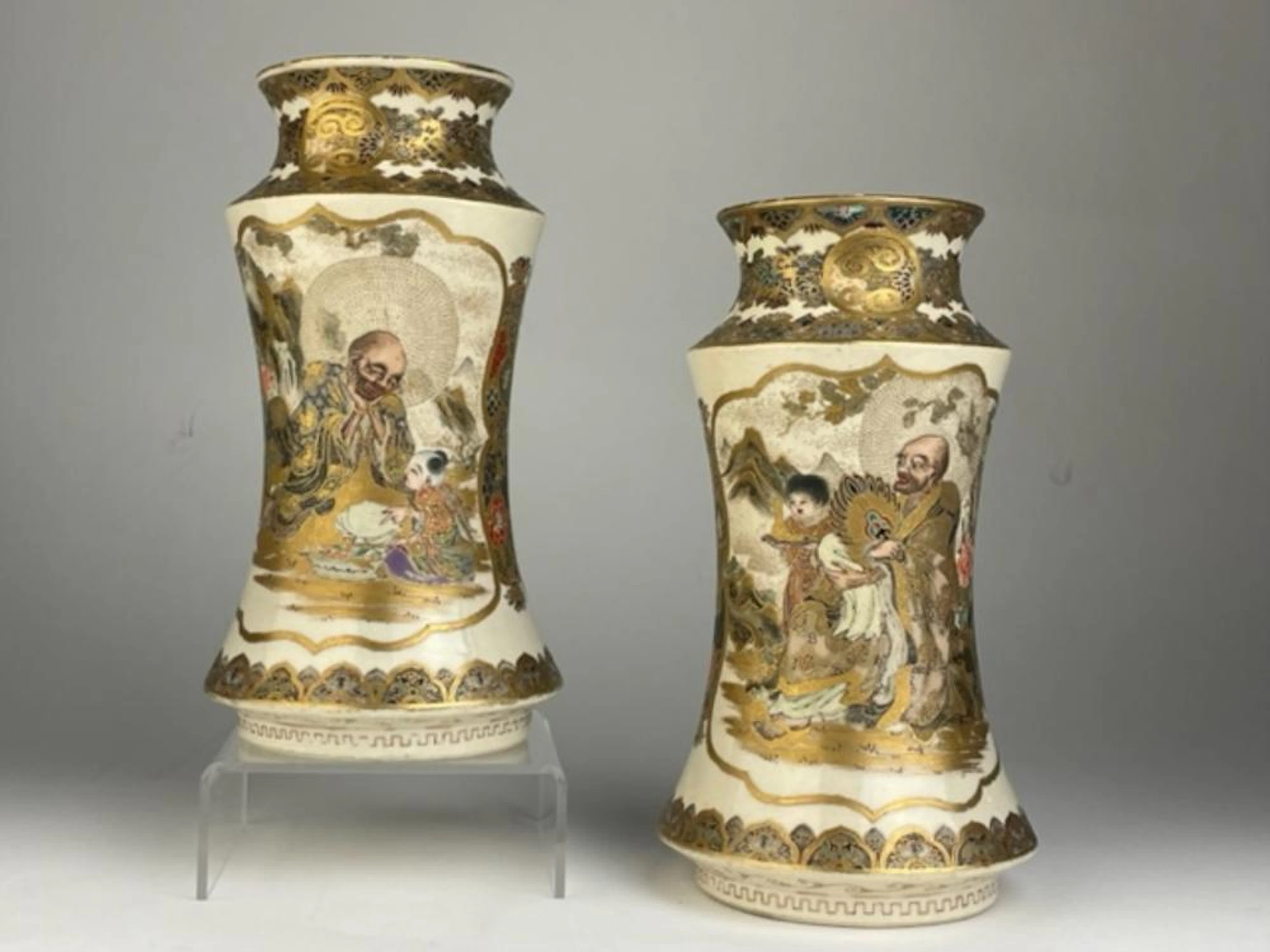 Japanese pair of Satsuma vases in a cylindical form with inverted tops.