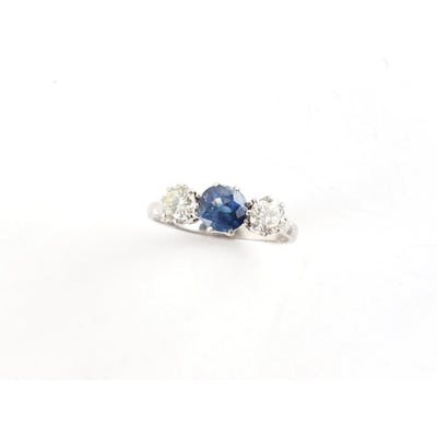 An 18ct white gold sapphire & diamond three stone ring, the ... | Barnebys