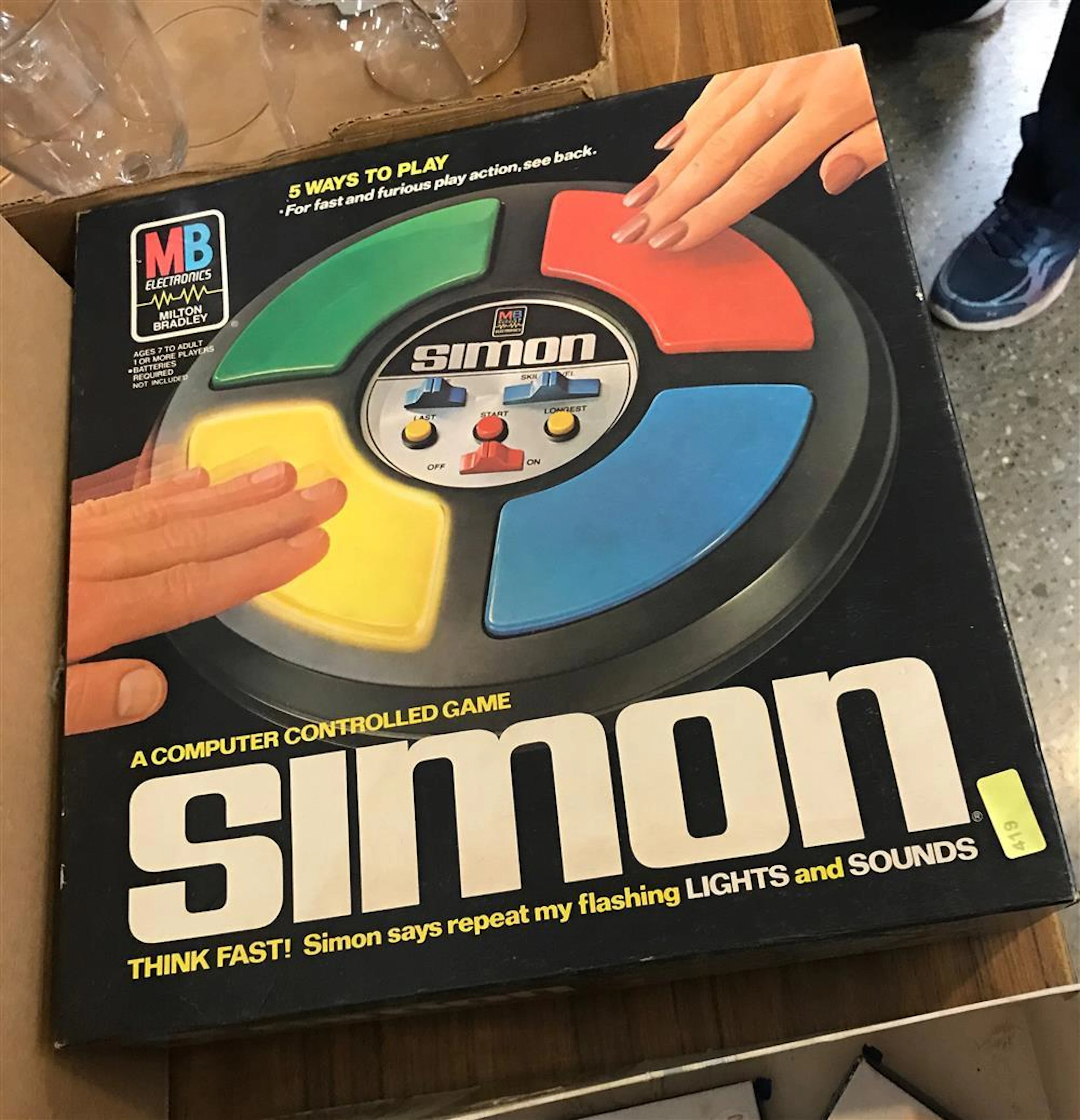 2 BOX LOTS WITH SIMON SAYS GAME, BRASS CANDLE HOLDERS, TV TRAYS
