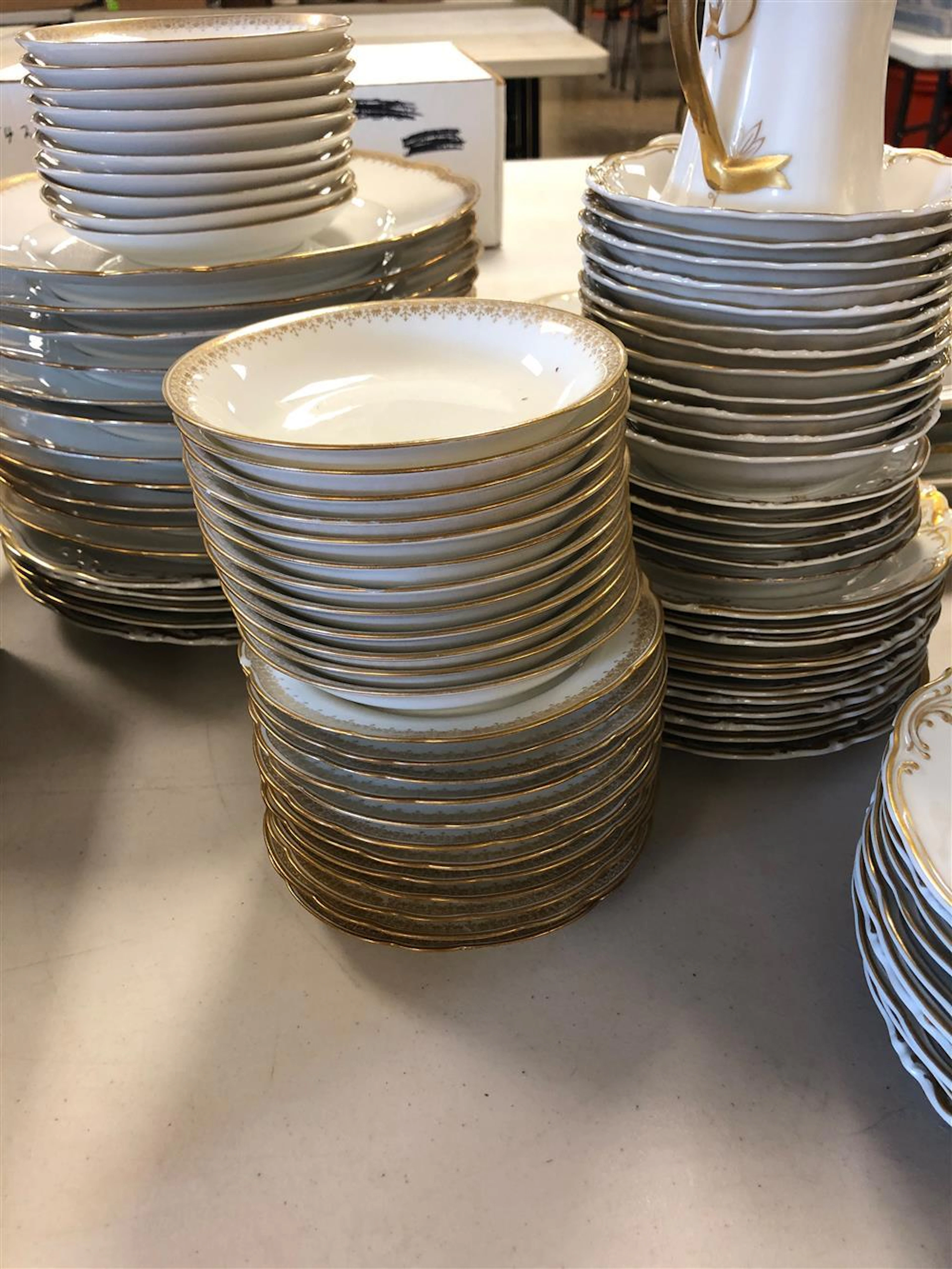 112 PC. MIXED PATTERNS WHITE AND GOLD CHINA SET