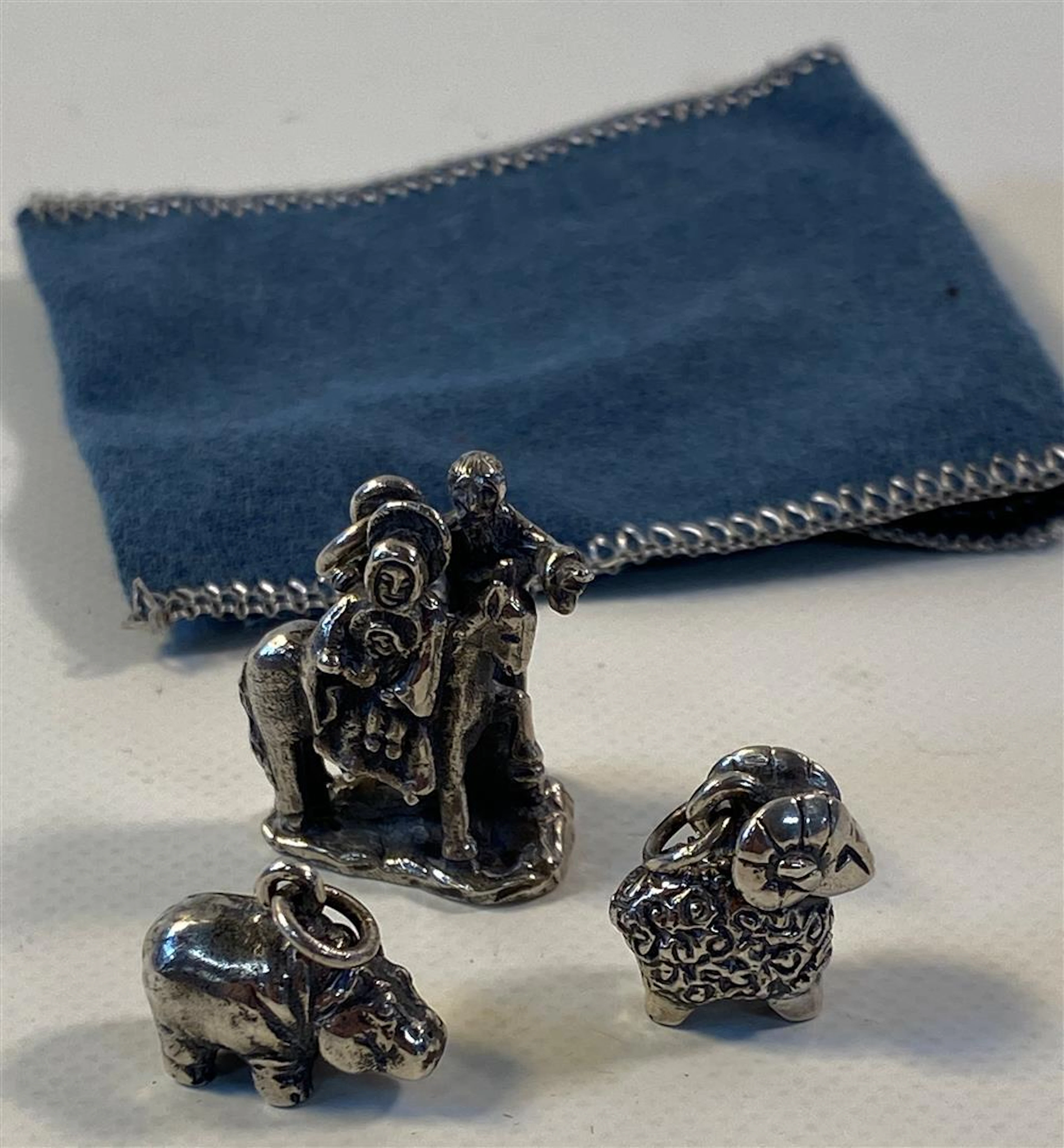 THREE STERLING SILVER JAMES AVERY CHARMS