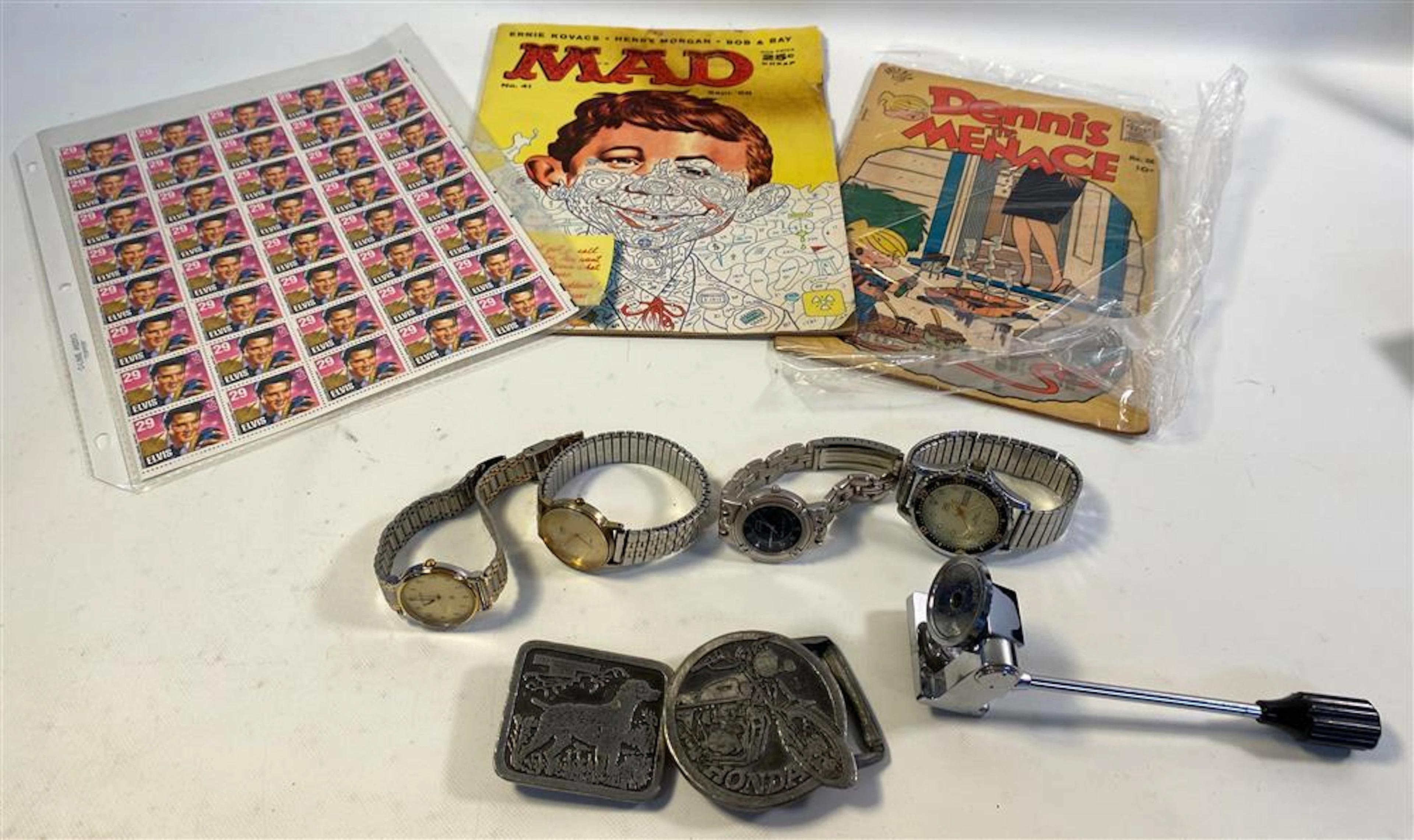 BOX LOT BELT BUCKLES, STAMP SHEETS, AND WRIST WATCHES