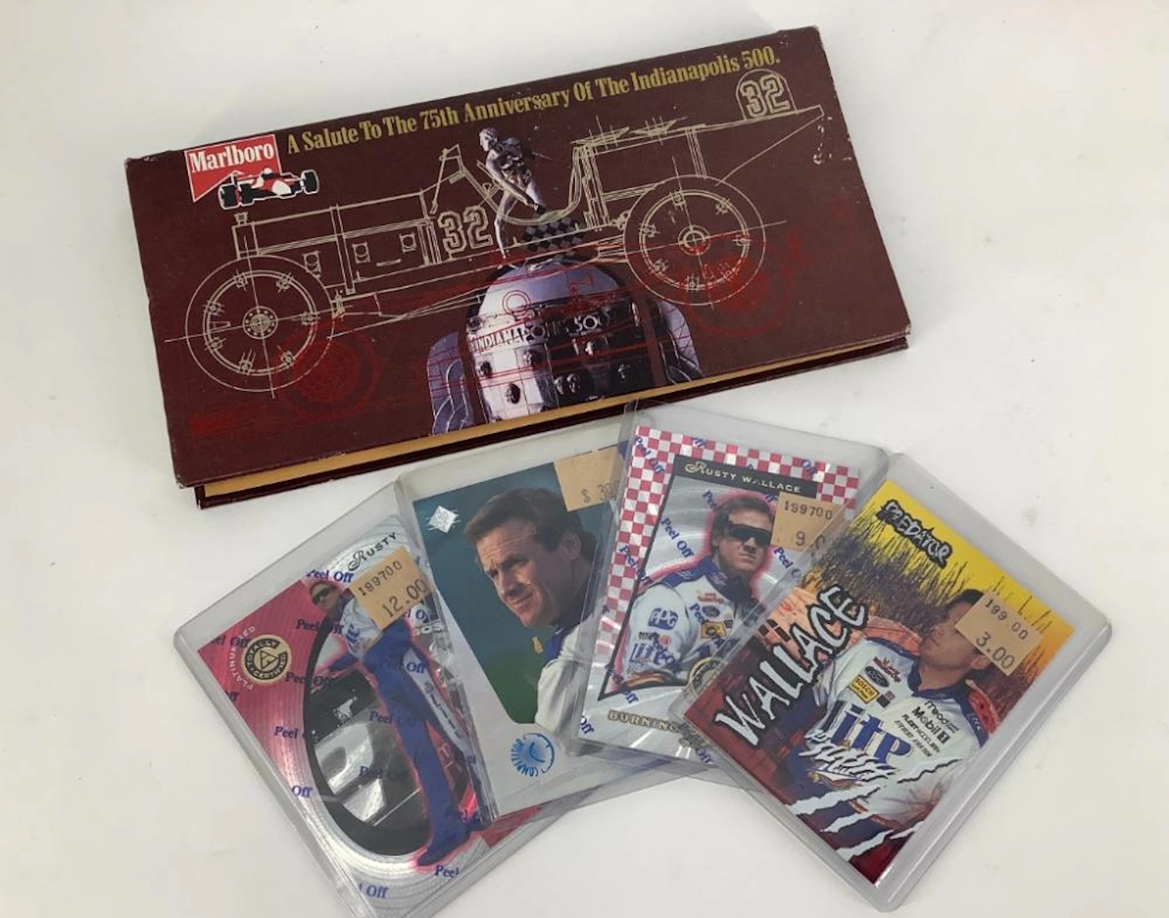 BOX LOT CONTAINING RACECAR MEMORABILIA INCLUDING A...