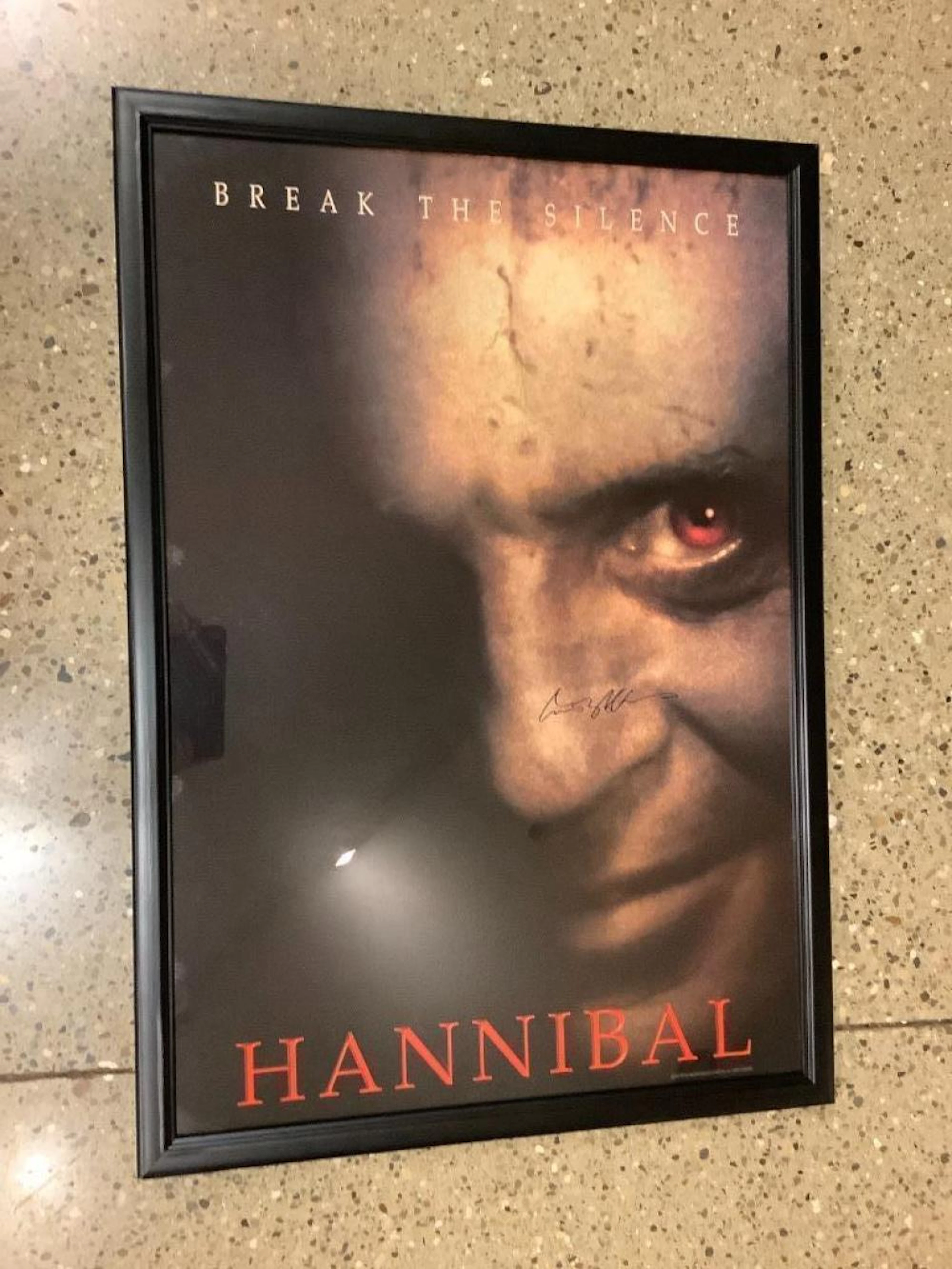 Framed Hannibal movie poster with unknown signature, no COA, 29.5? X 42?