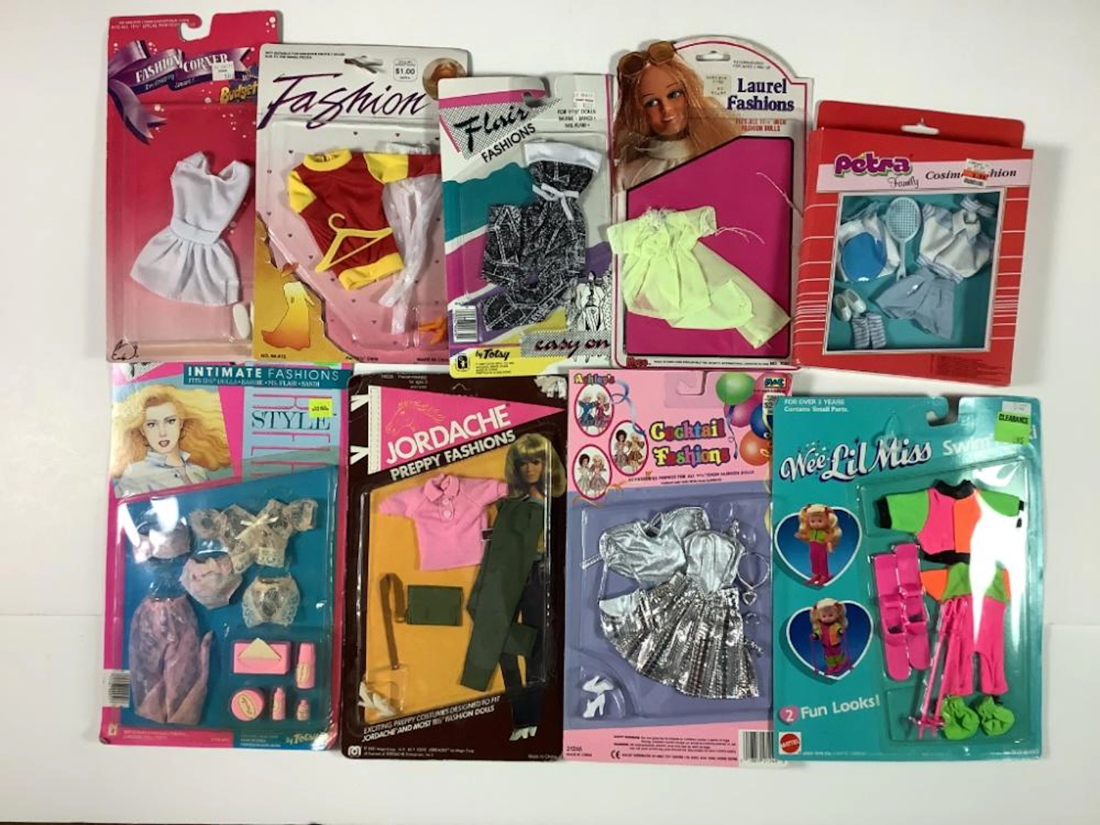 Lot of (16) packaged fashion doll clothes including Petra