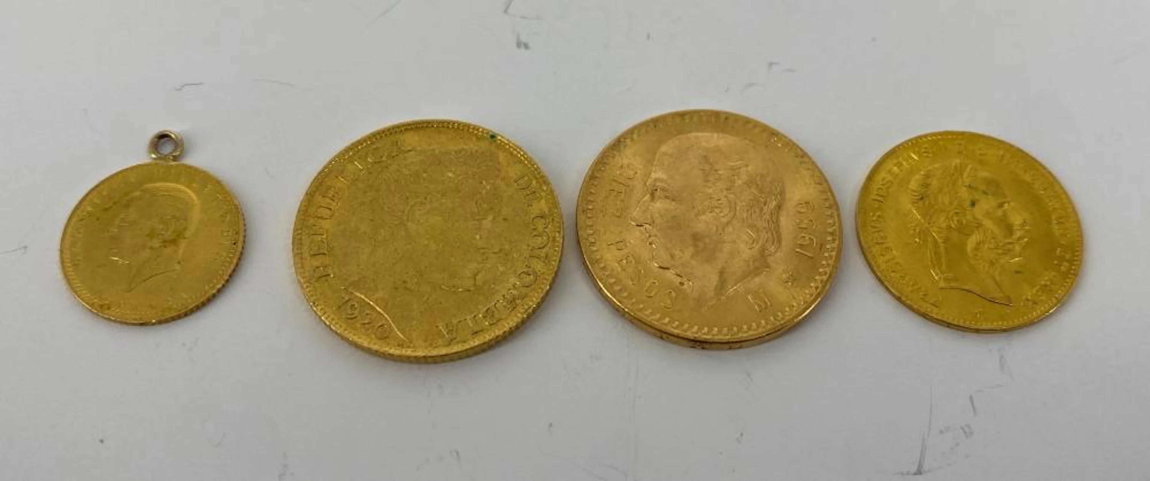 Four Foreign Gold Coins