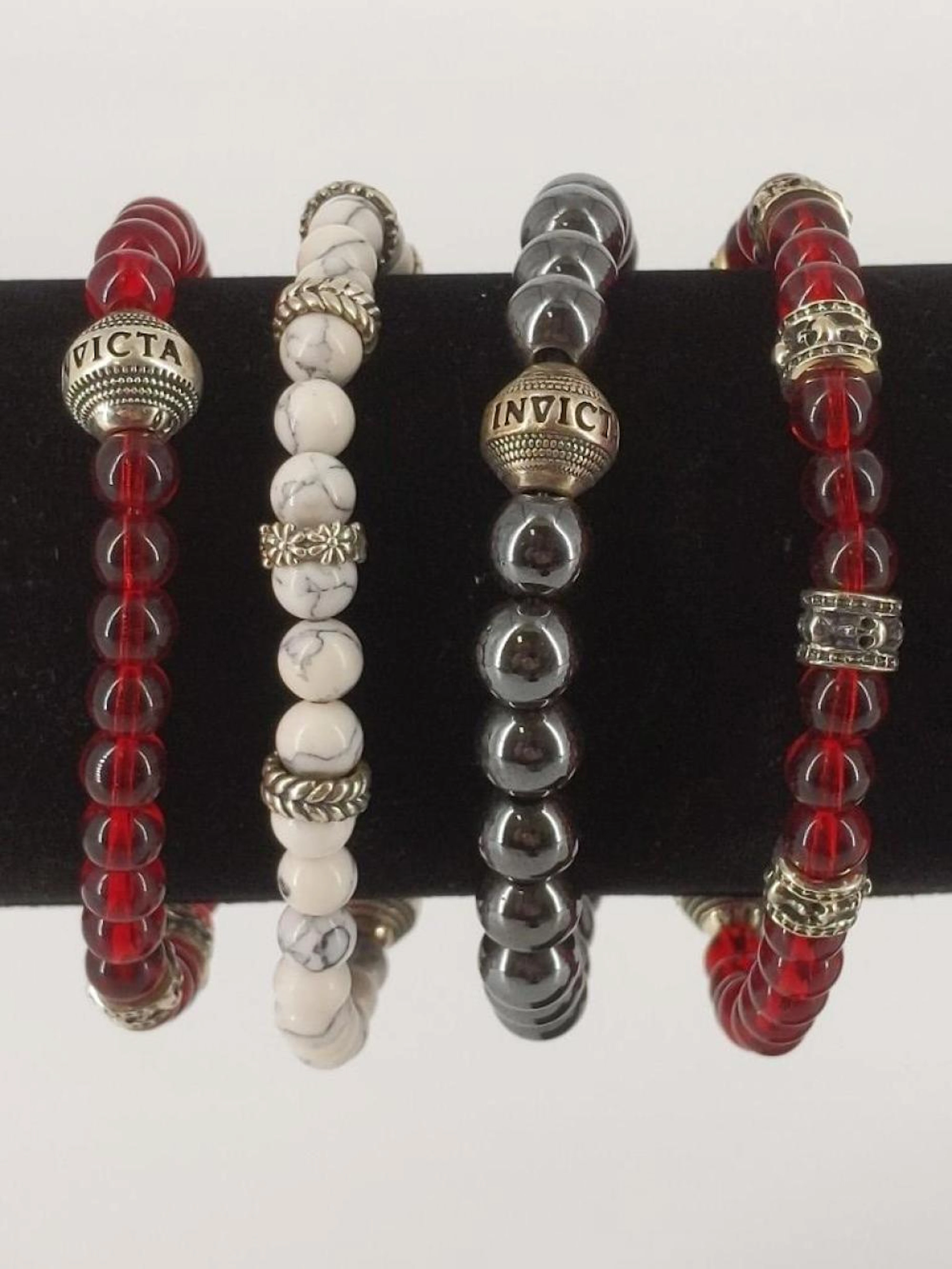 Four Invicta Bracelets