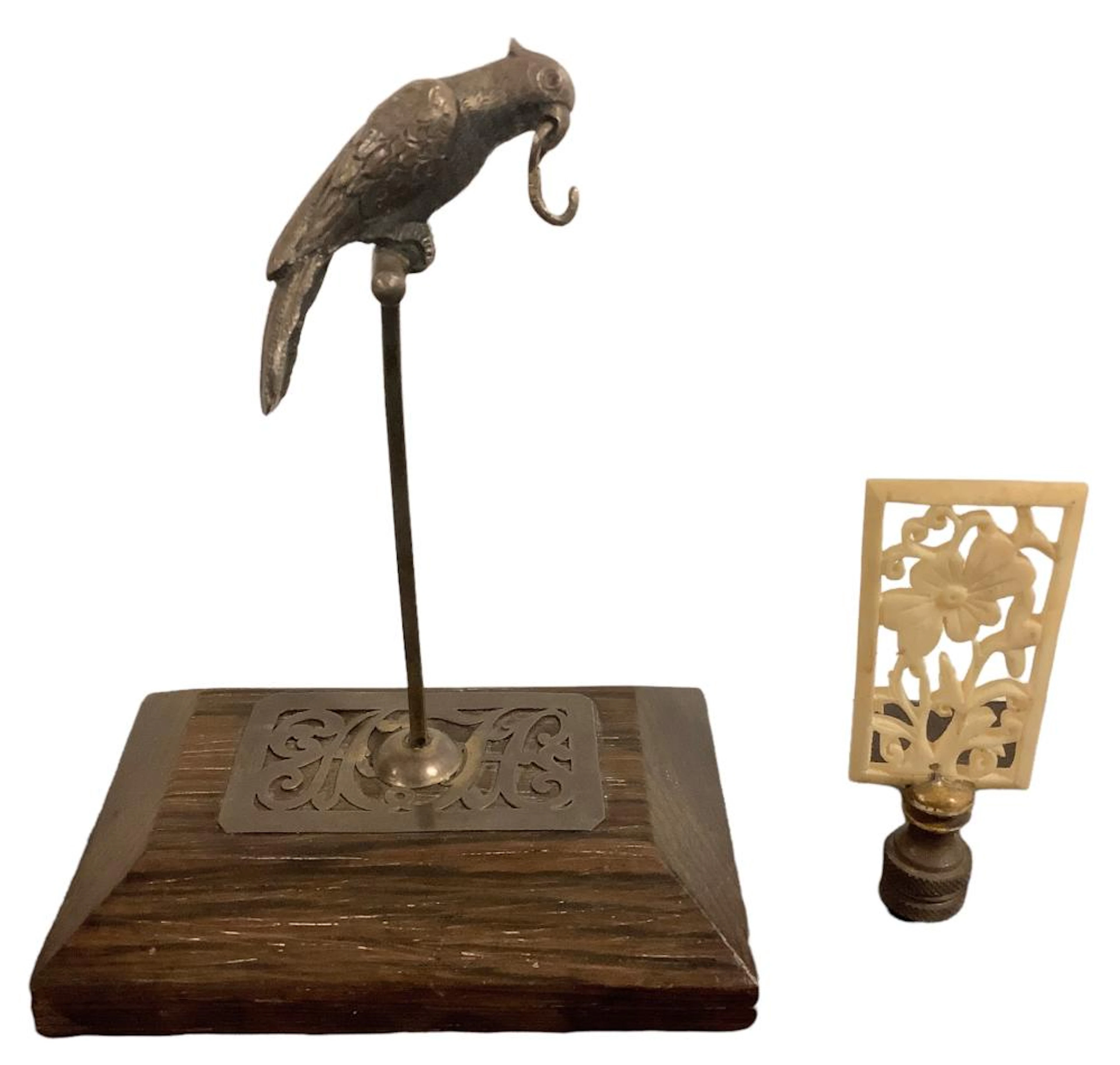 Unusual wood watch holder featuring a finely carved metal...