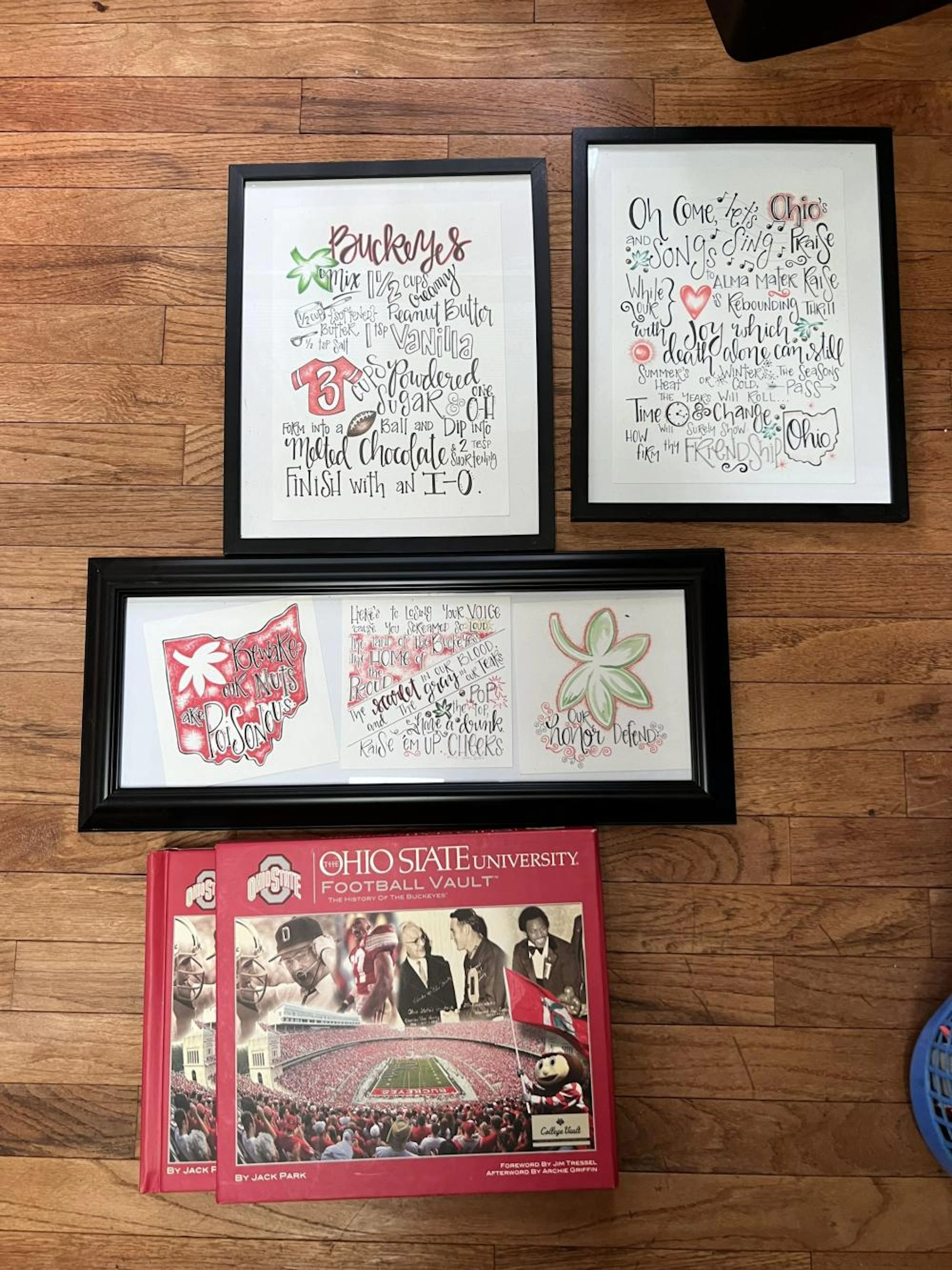 Collection of OSU Buckeye Prints and Ohio State University Football Vault Book.