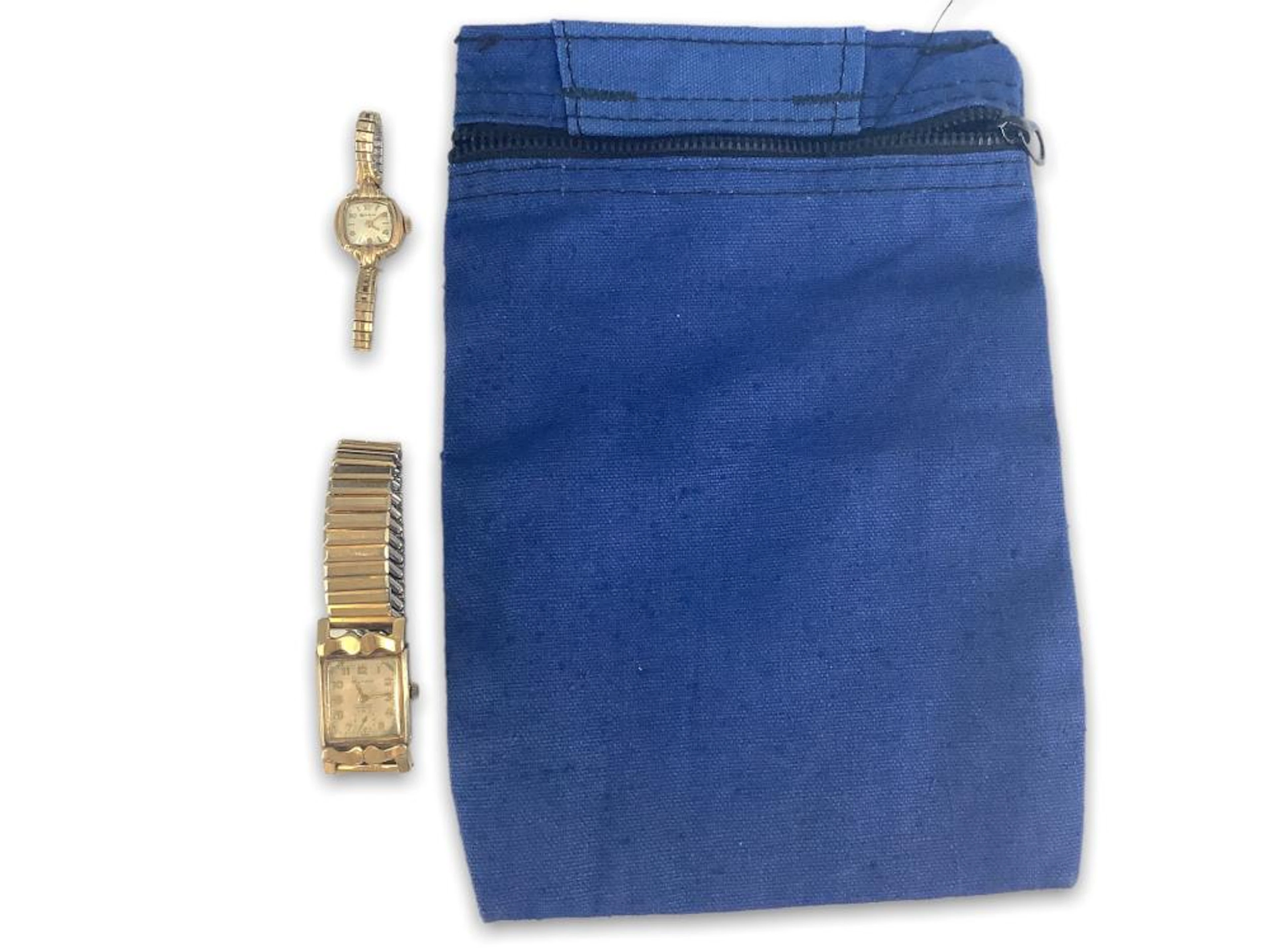 (1) Blue Fanny Pack & (2) Gold Tone Watches