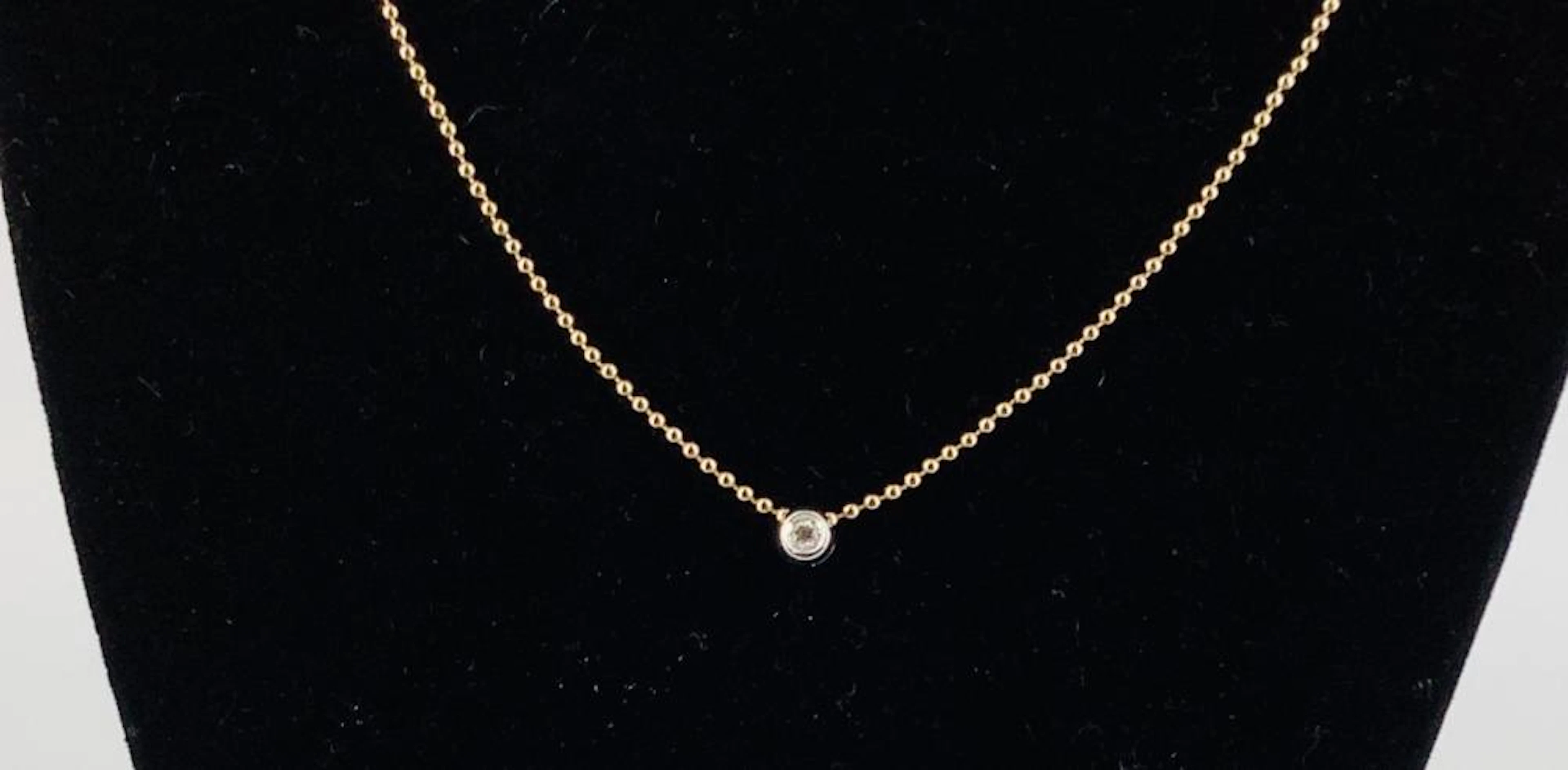 18kt Yellow Gold Ball Chan Necklace Containing A Small...