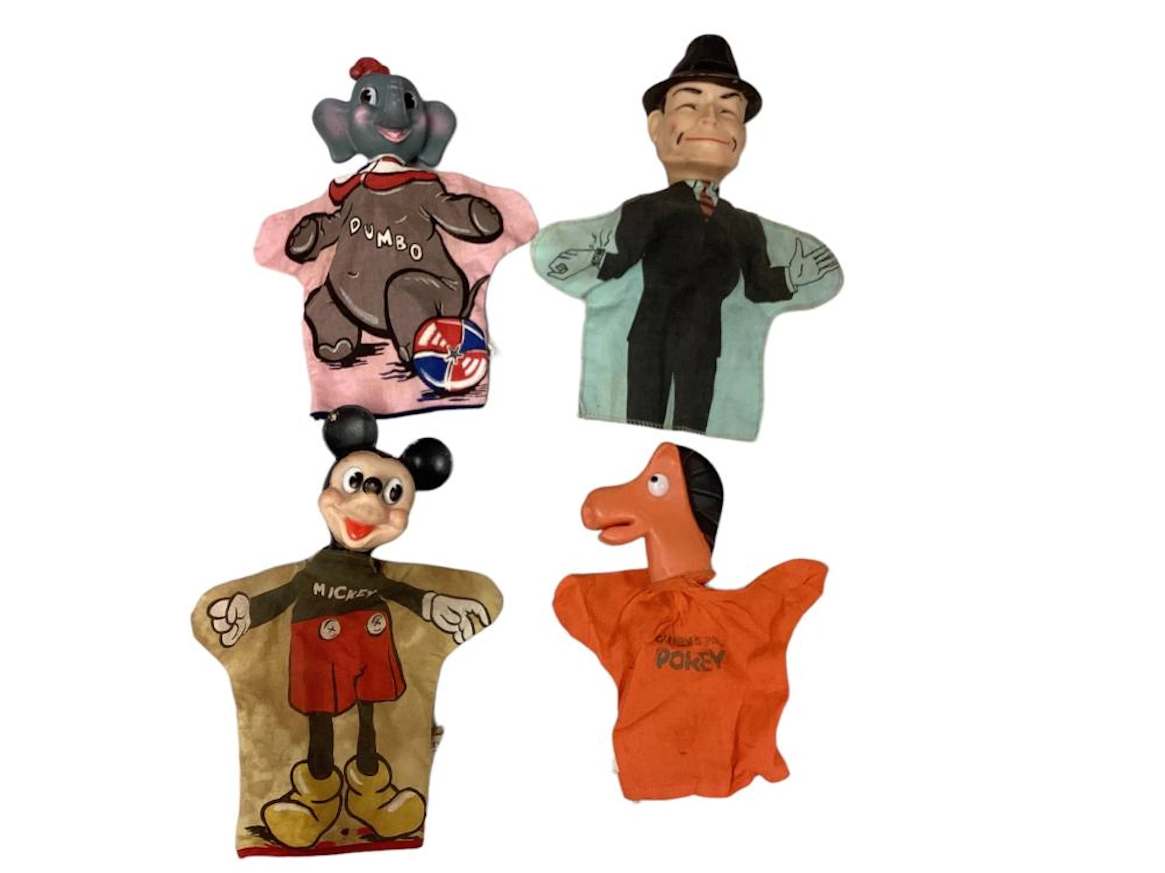 4 vintage cloth and vinyl head hand puppets including...