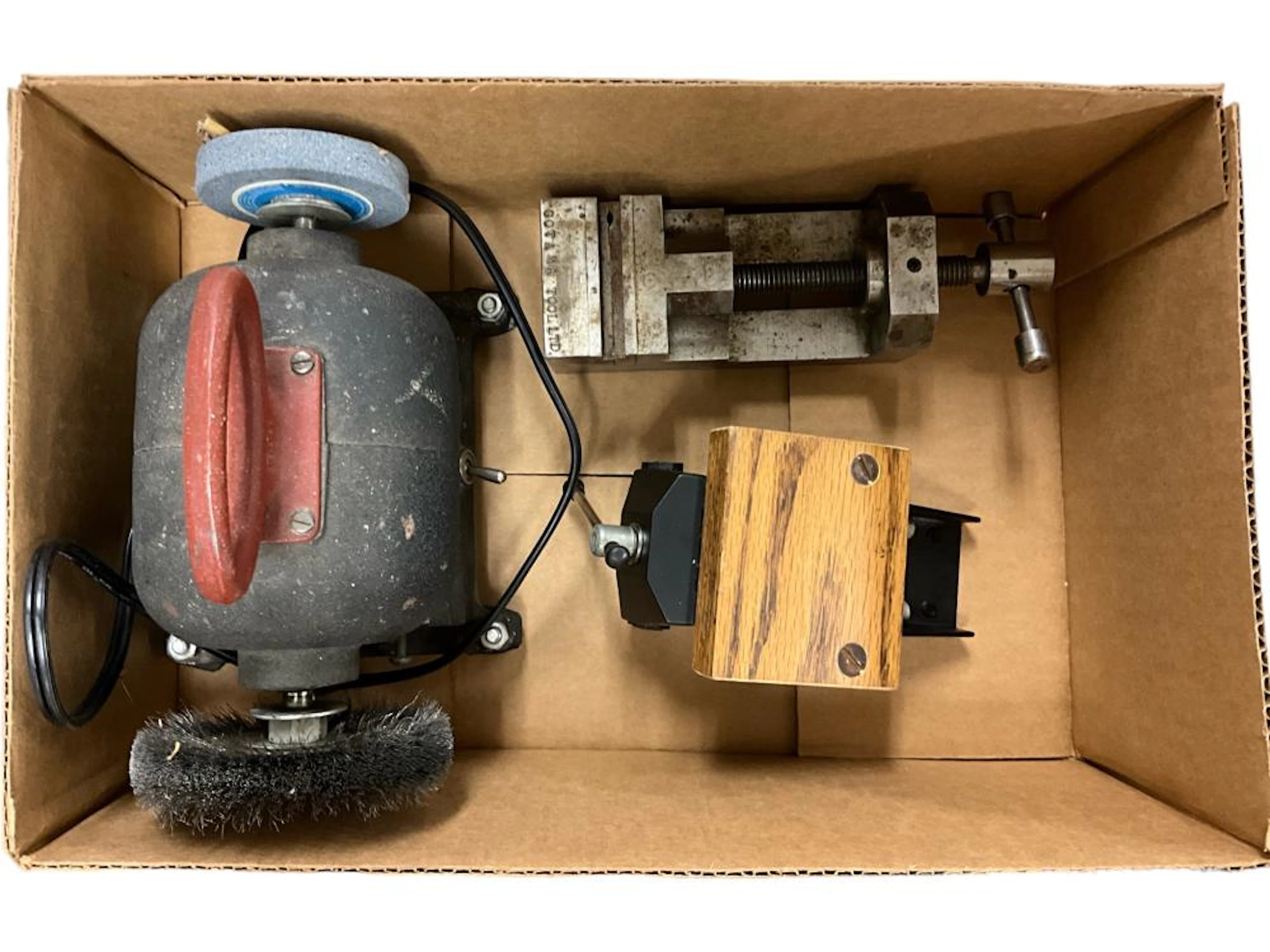 Watch and clock repair tools including two vises and bench grinder/polisher
